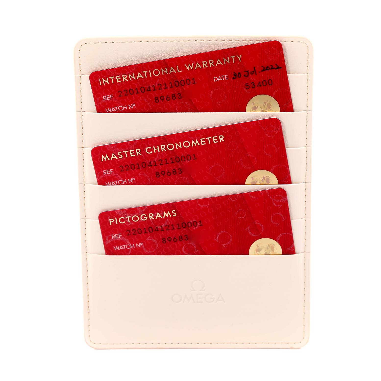 The image shows the international warranty, master chronometer, and pictograms cards for the Omega Aqua Terra 220.10.41.21.10.001 Men's Stainless Steel Green Dial 220.10.41.21.10.001 Men's Stainless Steel Green Dial watch.