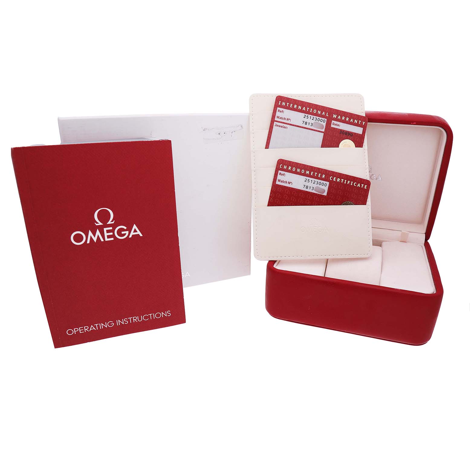 The image shows the Omega Seamaster 2512.30.00 Men's Stainless Steel Silver Dial accessories, including a watch box, instruction booklet, and two certification cards.