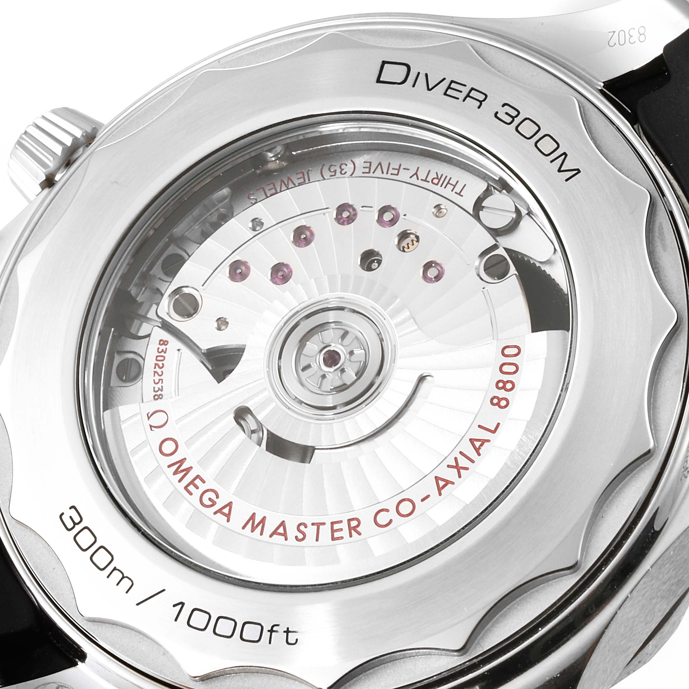 The image shows the caseback of an Omega Seamaster 210.32.42.20.04.001 Men
s Stainless Steel White Dial 210.32.42.20.04.001 Men
s Stainless Steel White Dial Diver 300M, revealing its Omega Master Co-Axial 8800 movement.