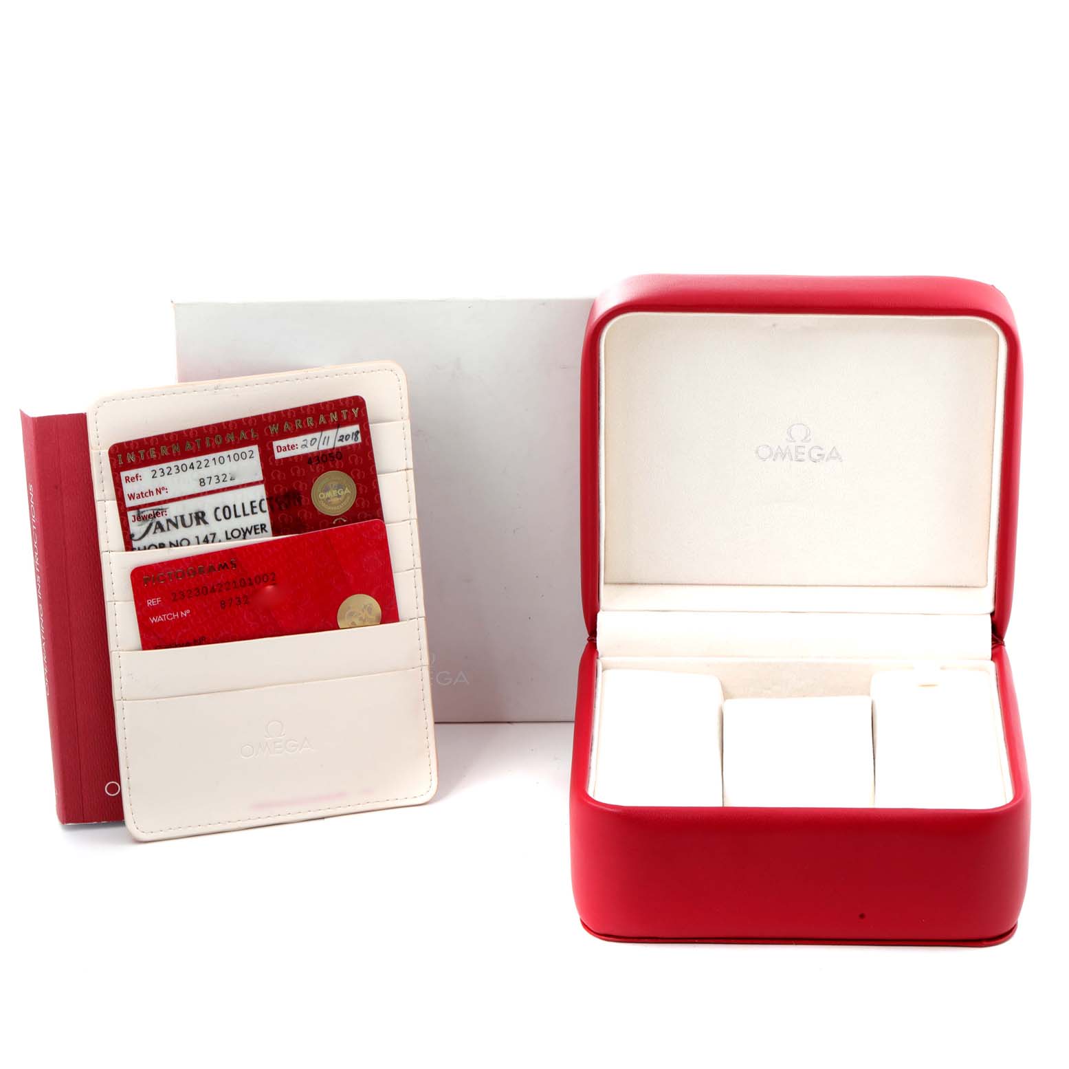 This image shows the packaging and warranty cards for the Omega Planet Ocean 232.30.42.21.01.002 Men
s Stainless Steel Black Dial 232.30.42.21.01.002 Men
s Stainless Steel Black Dial watch.