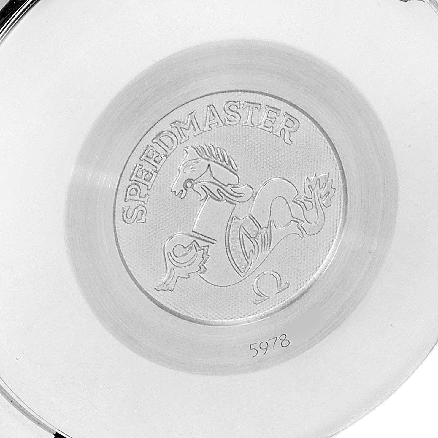 This image shows the case back of an Omega Speedmaster 3513.50.00 Men
s Stainless Steel Black Dial 3513.50.00 Men
s Stainless Steel Black Dial watch, featuring the engraved logo and some serial numbers.