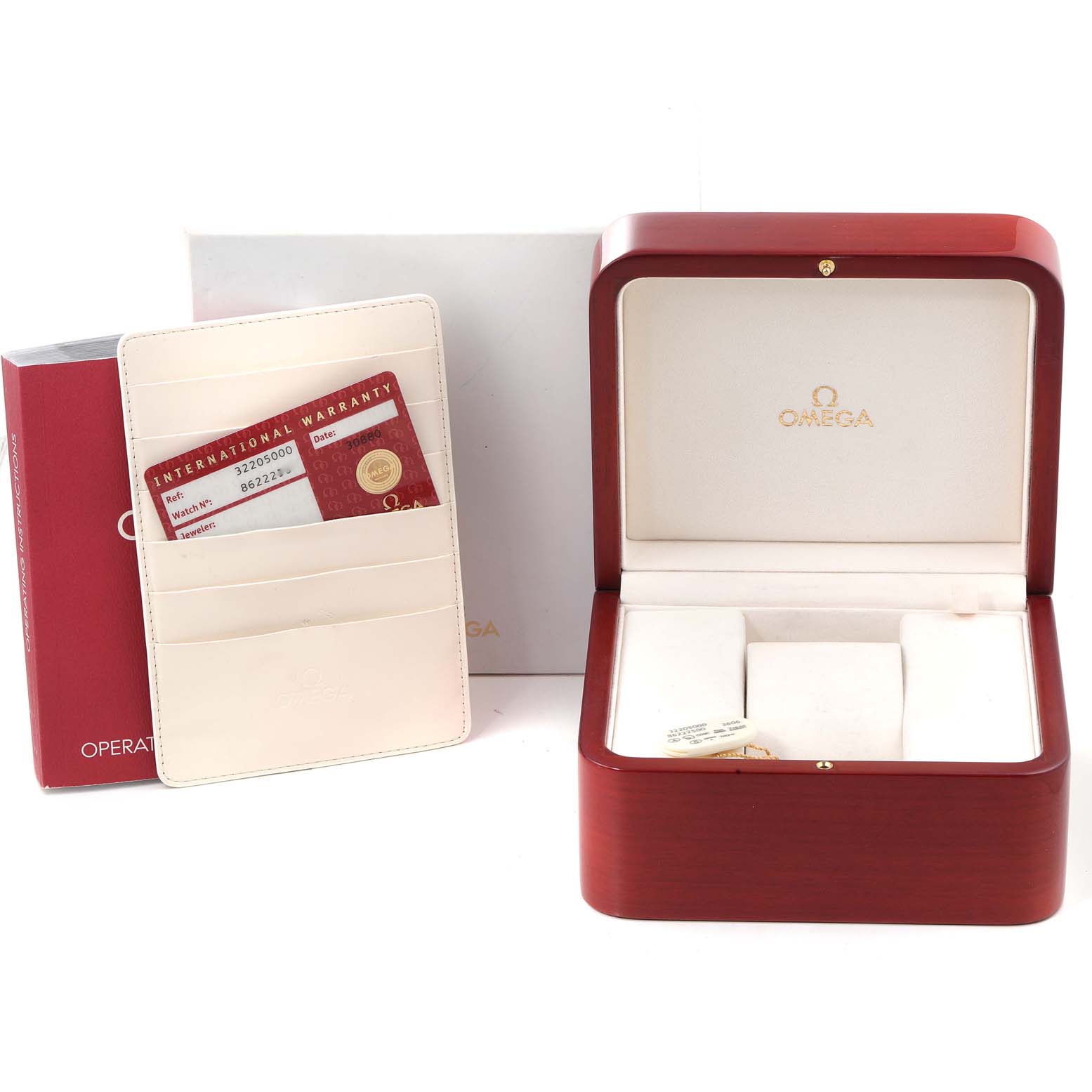 This image shows the presentation box, warranty cards, and packaging for an Omega Speedmaster 3220.50.00 Men
s Stainless Steel Black Dial 3220.50.00 Men
s Stainless Steel Black Dial watch.