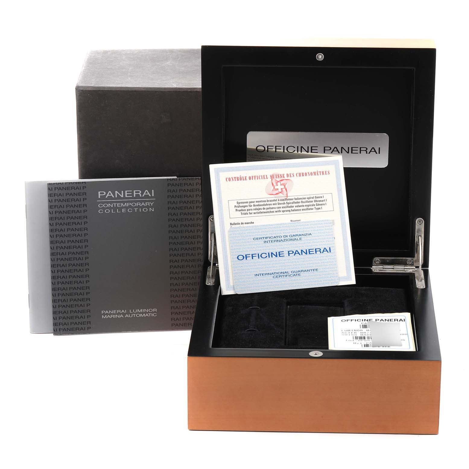 This image shows the packaging, booklet, guarantee certificate, and presentation box for the Panerai Luminor PAM00104 Men
s Stainless Steel Black Dial PAM00104 Men
s Stainless Steel Black Dial model watch.