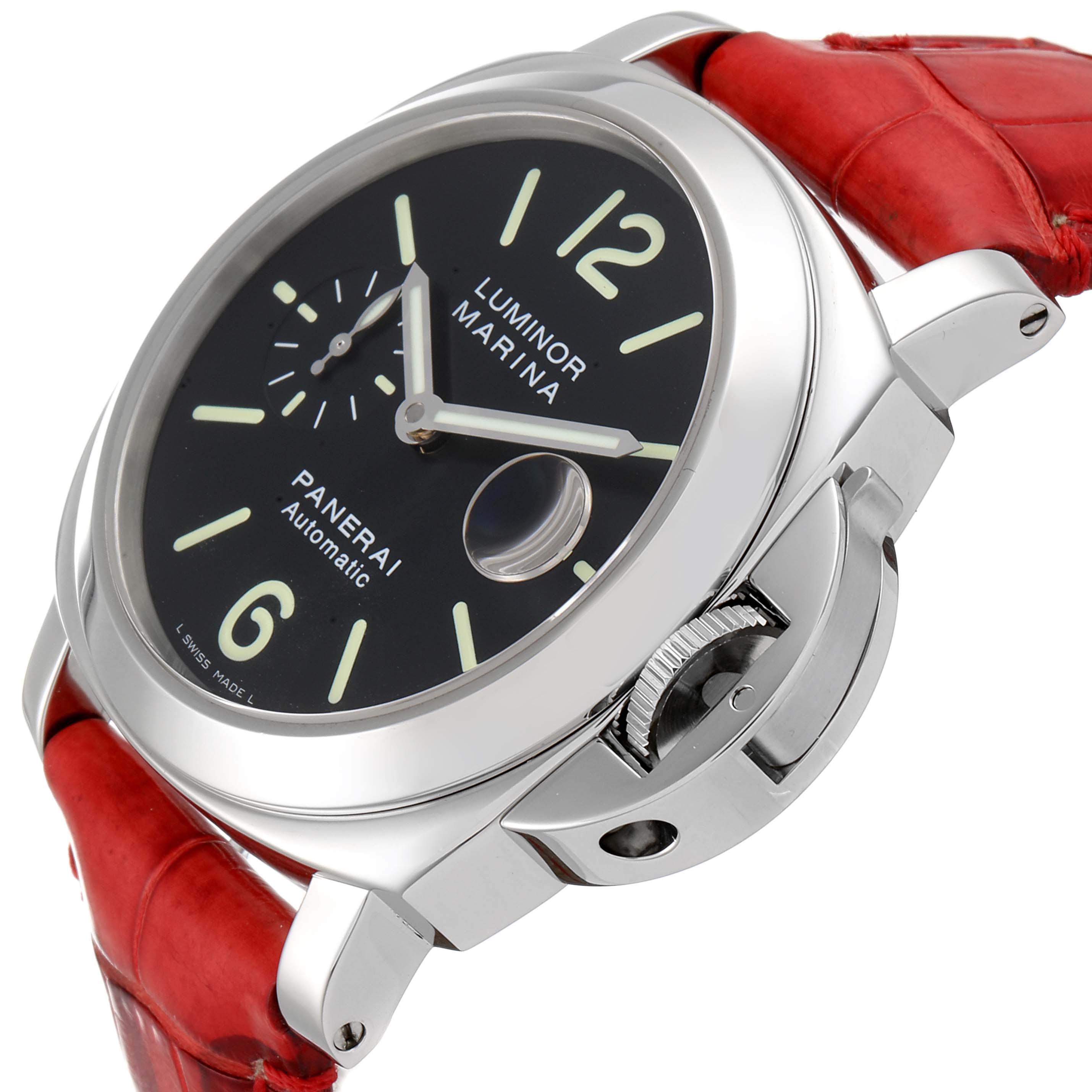 This is an angled view of a Panerai Luminor PAM00104 Men
s Stainless Steel Black Dial PAM00104 Men
s Stainless Steel Black Dial watch showcasing the dial, crown guard, and red leather strap.