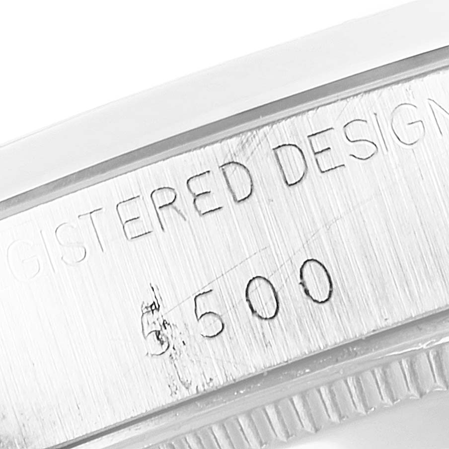 The image shows an engraved side view of the bezel and case of a Rolex Vintage Collection 5500 Men's Stainless Steel Silver Dial 5500 Men's Stainless Steel Silver Dial watch.