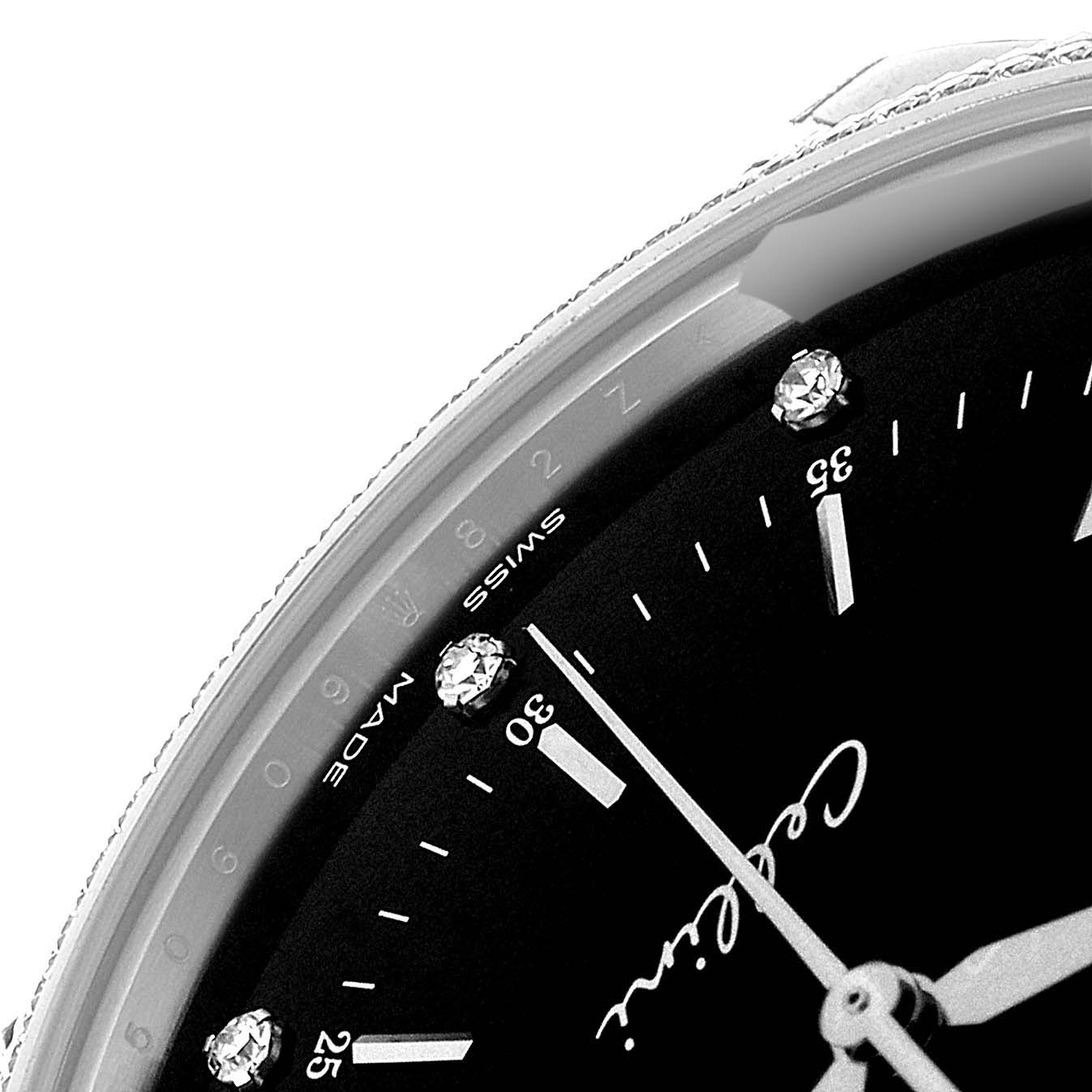 This image shows a close-up angle of the dial of a Rolex Cellini 50609RBR Men's White Gold Black Dial 50609RBR Men's White Gold Black Dial watch, displaying diamond hour markers and part of the minute hand.