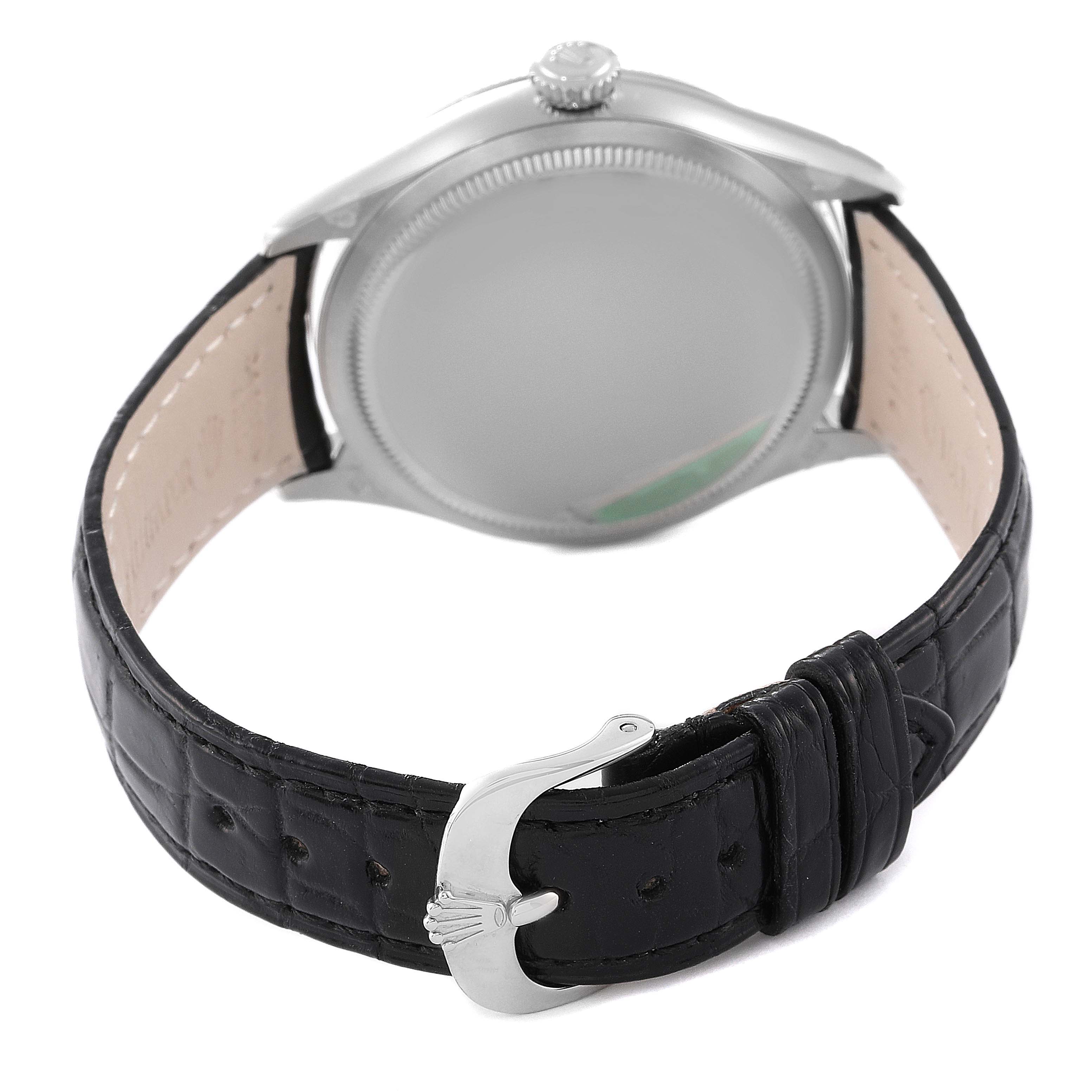 The image shows the back view of a Rolex Cellini 50609RBR Men's White Gold Black Dial 50609RBR Men's White Gold Black Dial watch, highlighting its case back and leather strap with buckle.