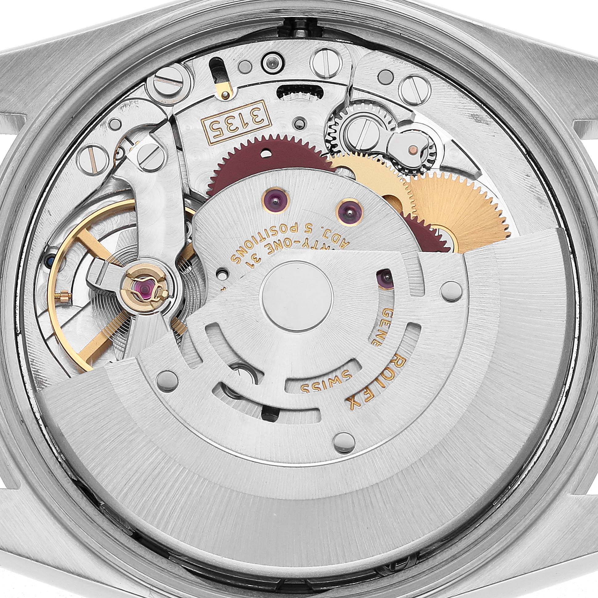 The image shows the internal mechanism of a Rolex Date 15210 Men's Stainless Steel Silver Dial model watch from the back, highlighting the movement components.