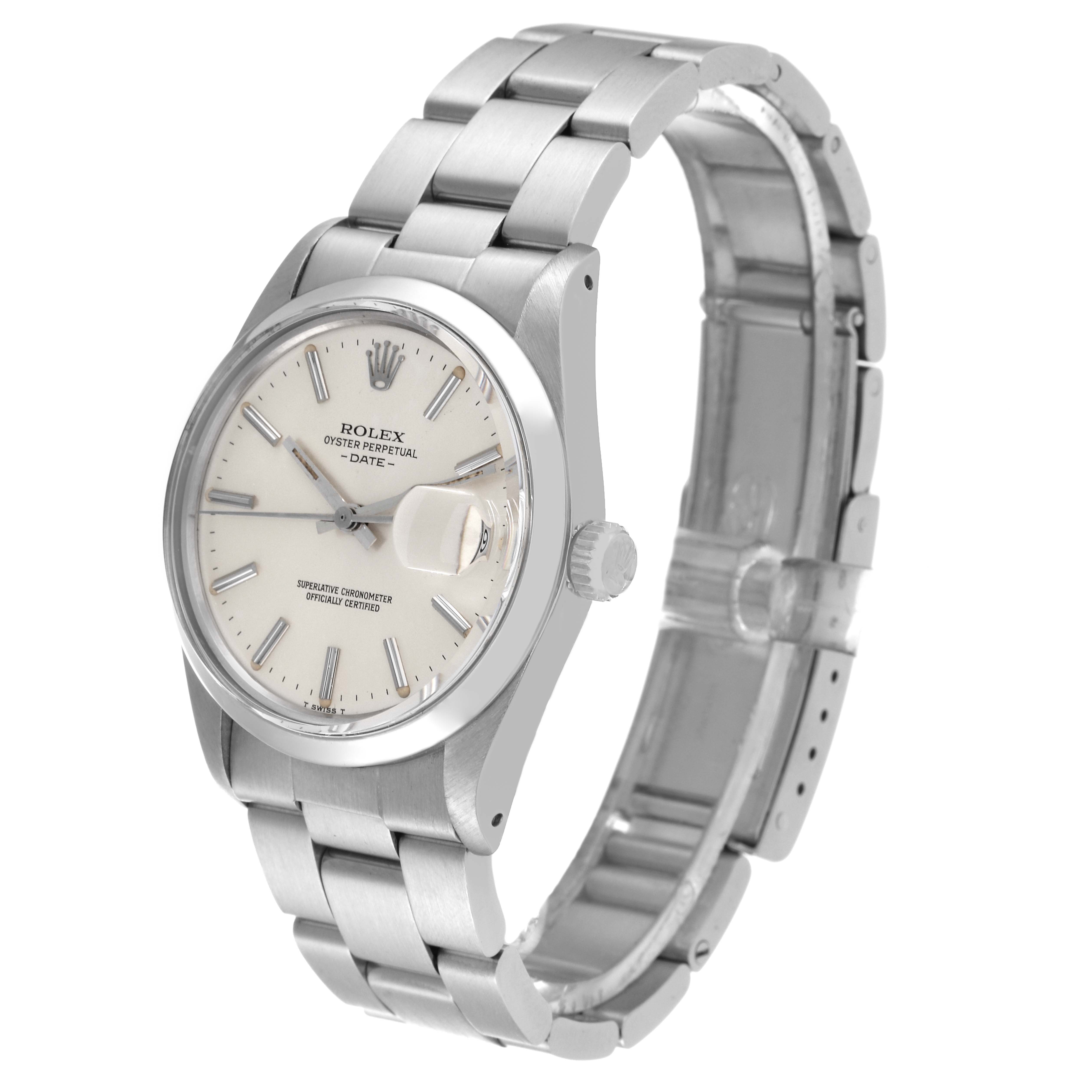 The image shows a side angle view of the Rolex Vintage Collection 15000 Men
s Stainless Steel Silver Dial 15000 Men
s Stainless Steel Silver Dial watch, highlighting its face, bezel, and metal strap.