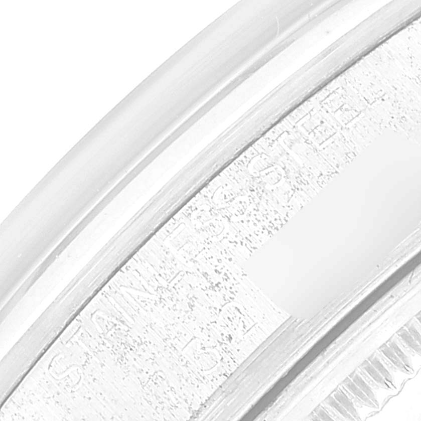 This image shows a close-up of the engraved stainless steel band of the Rolex Vintage Collection 15000 Men
s Stainless Steel Silver Dial 15000 Men
s Stainless Steel Silver Dial model.