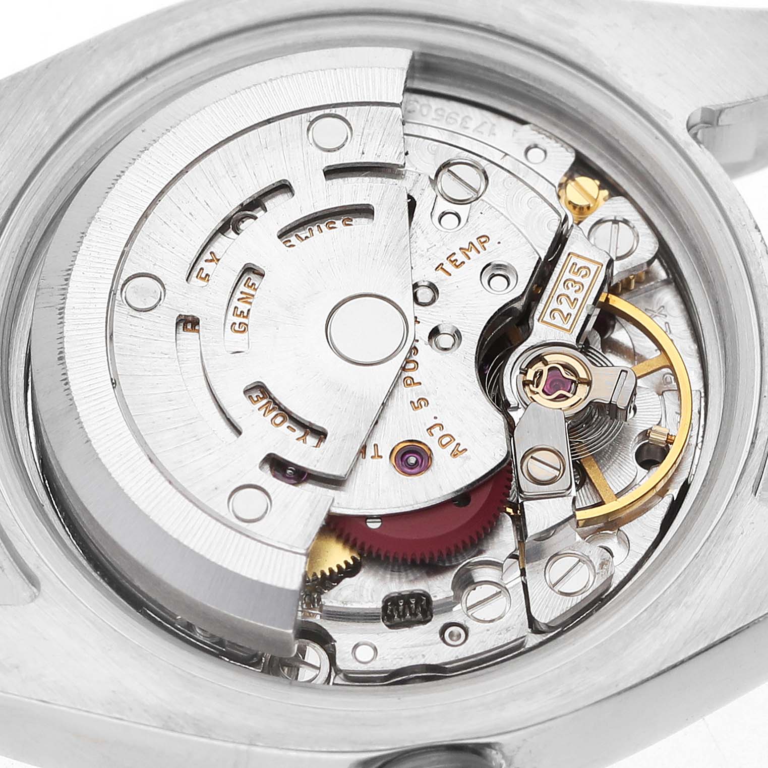 The image shows an interior view of the Rolex Datejust 179173 Women's Steel and Gold (two tone) Black Dial watch, featuring its intricate movement mechanism.