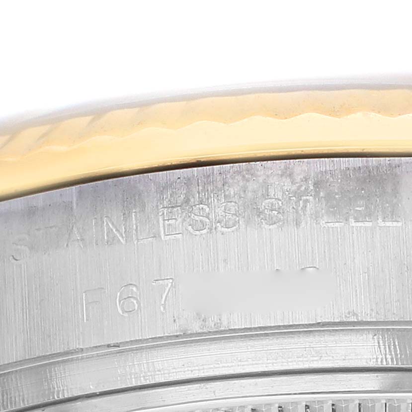 The image shows a close-up of the side of a Rolex Datejust 179173 Women's Steel and Gold (two tone) Black Dial watch, highlighting the stainless steel and gold bezel.