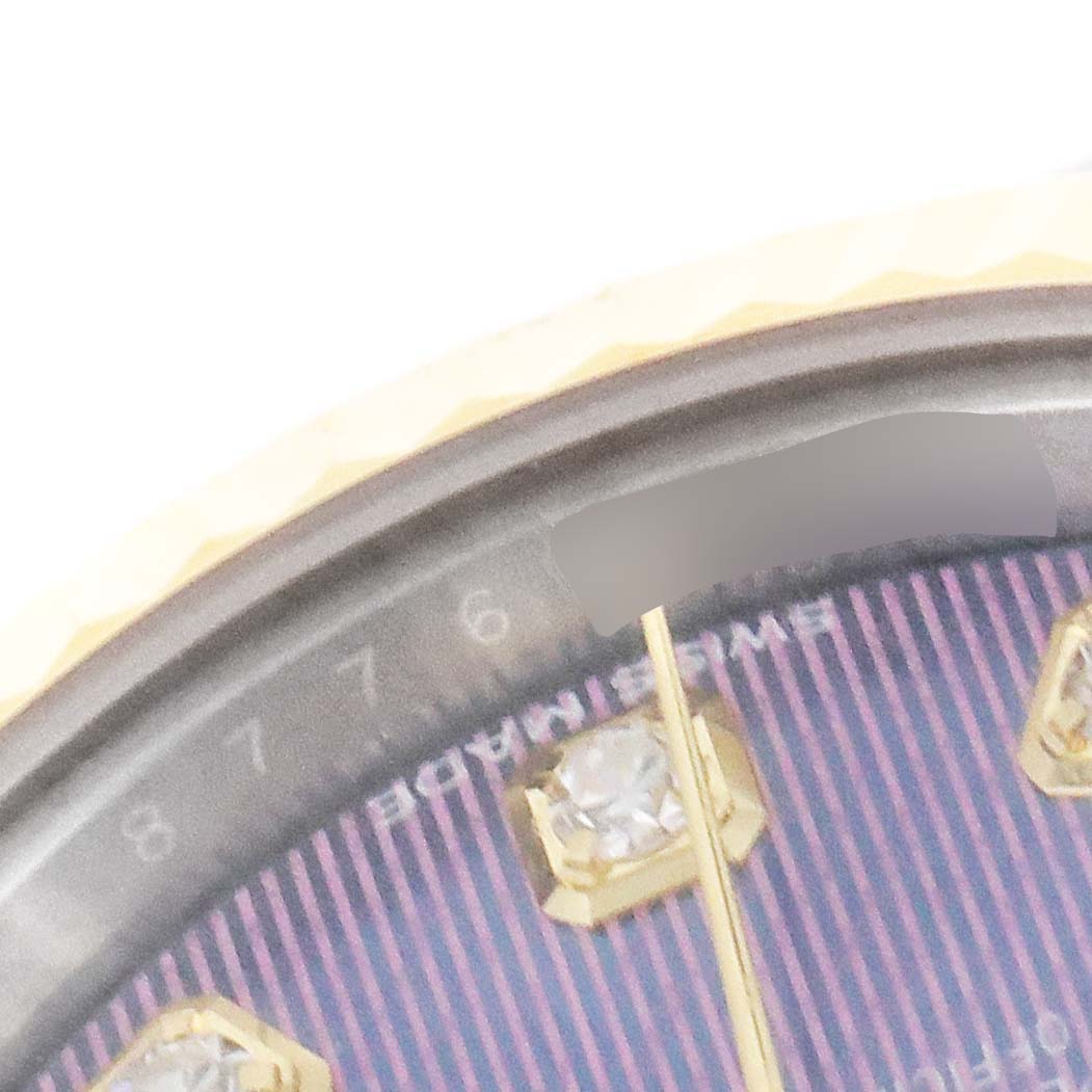 This image shows a close-up of the bezel, part of the dial, and diamonds on a Rolex Datejust 279173 Women
s Steel and Gold (two tone) Purple Dial 279173 Women
s Steel and Gold (two tone) Purple Dial watch.