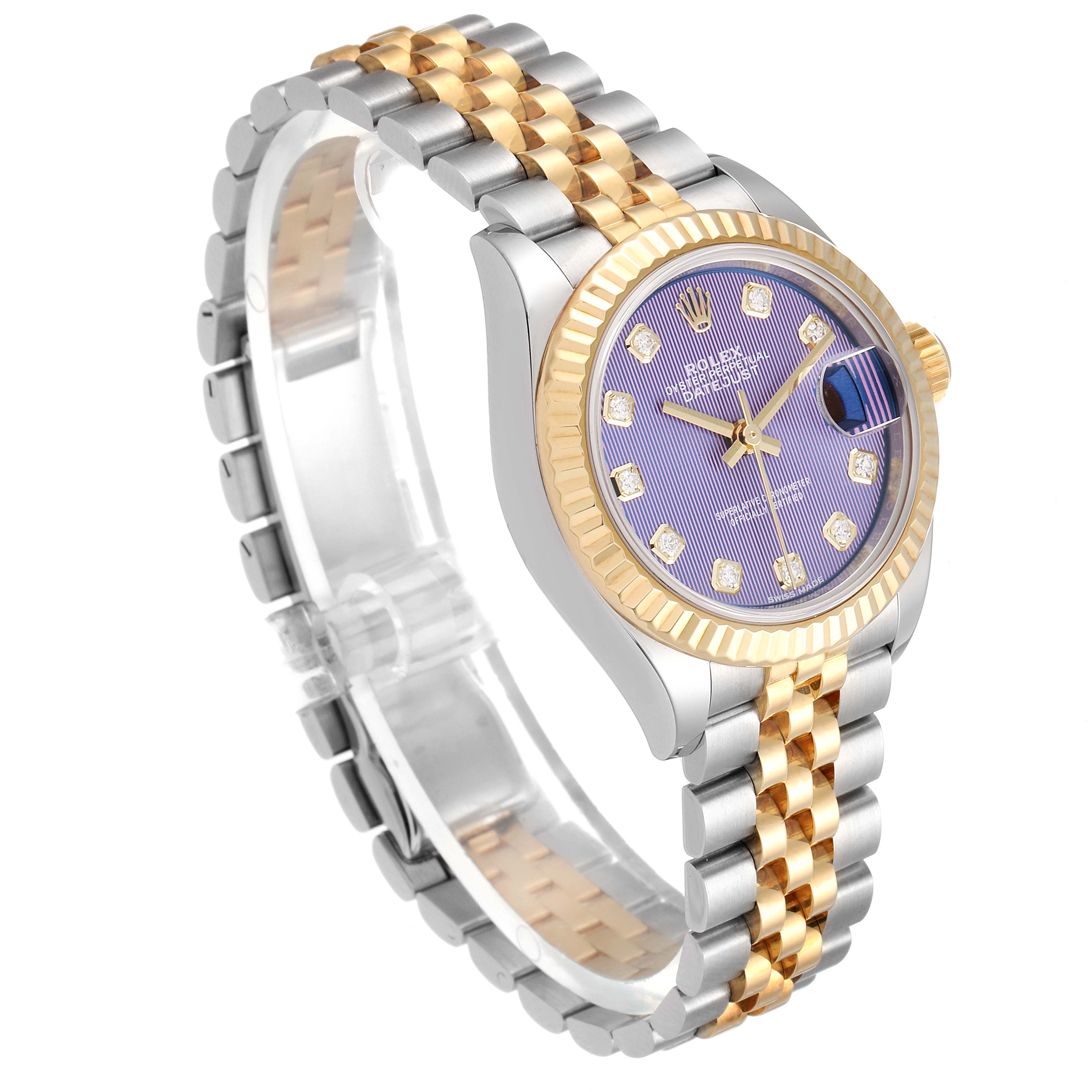 The image shows a Rolex Datejust 279173 Women
s Steel and Gold (two tone) Purple Dial 279173 Women
s Steel and Gold (two tone) Purple Dial watch from a three-quarter angle, highlighting the case, dial, bezel, and two-tone bracelet.