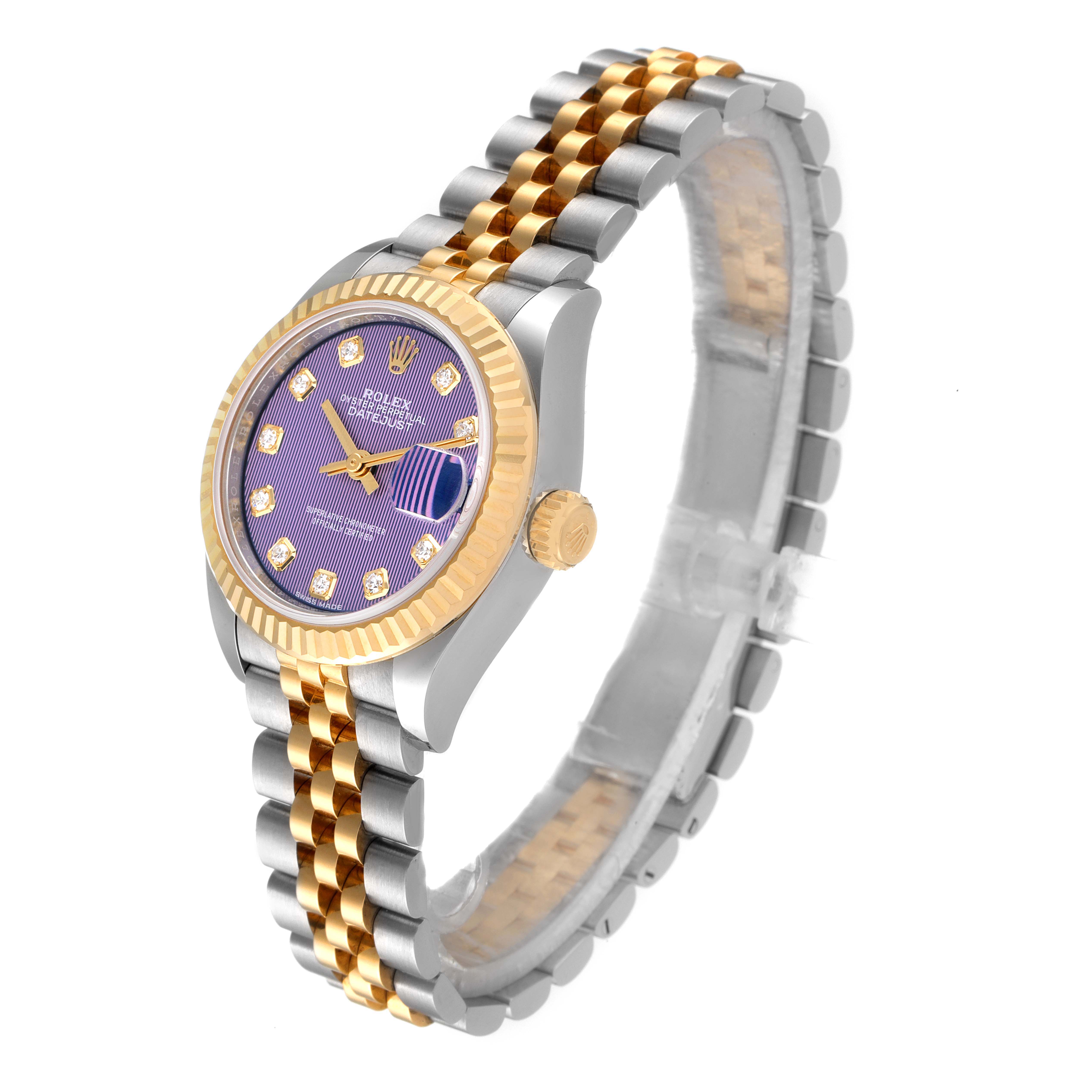 The Rolex Datejust 279173 Women's Stainless Steel Purple Dial 279173 Women's Stainless Steel Purple Dial watch is shown at a slight angle, highlighting its purple dial, diamond hour markers, fluted bezel, and two-tone bracelet.
