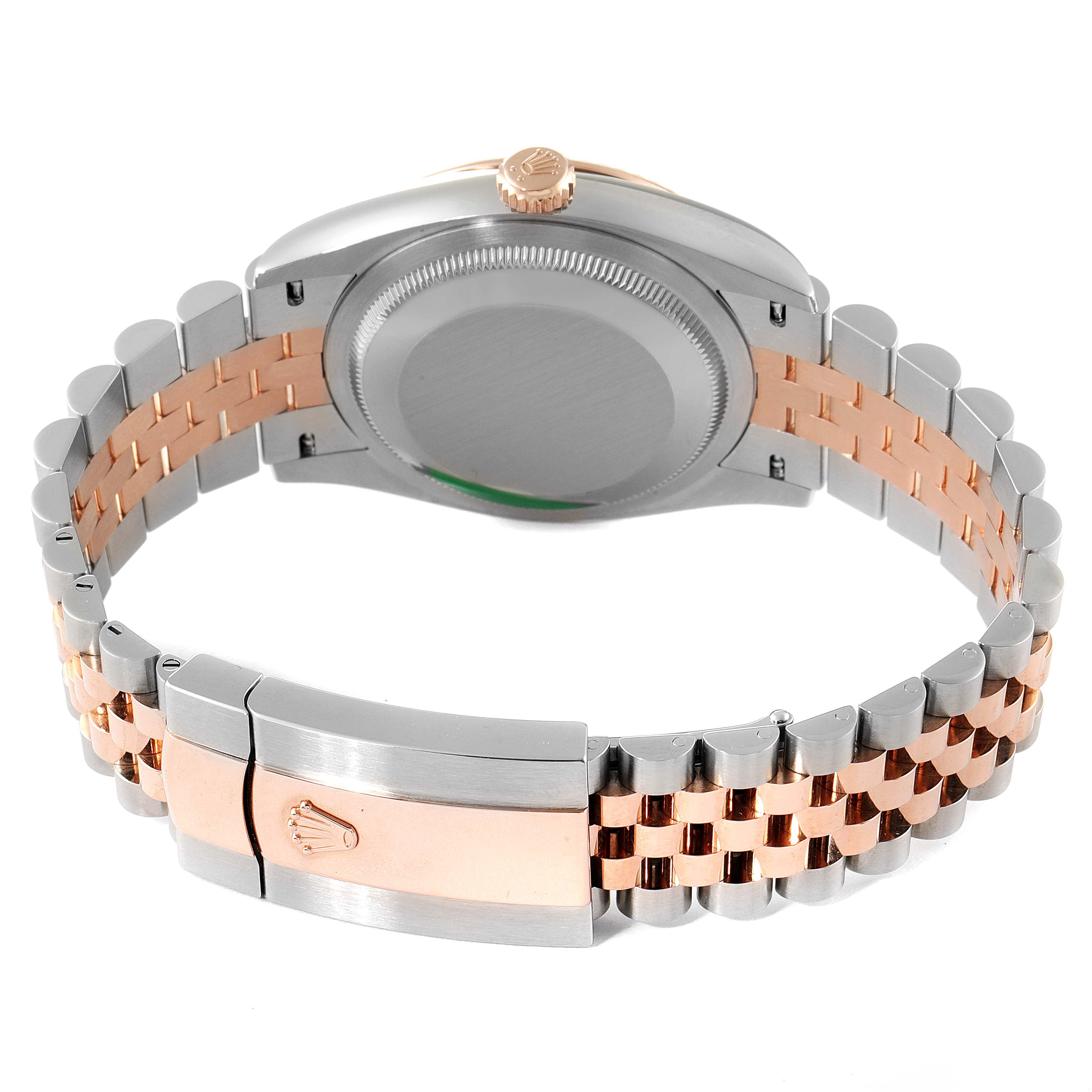 The image shows the back view of a Rolex Datejust 126231 Men's Steel and Gold (two tone) Silver Dial 126231 Men's Steel and Gold (two tone) Silver Dial watch, highlighting its clasp, bracelet, and caseback.