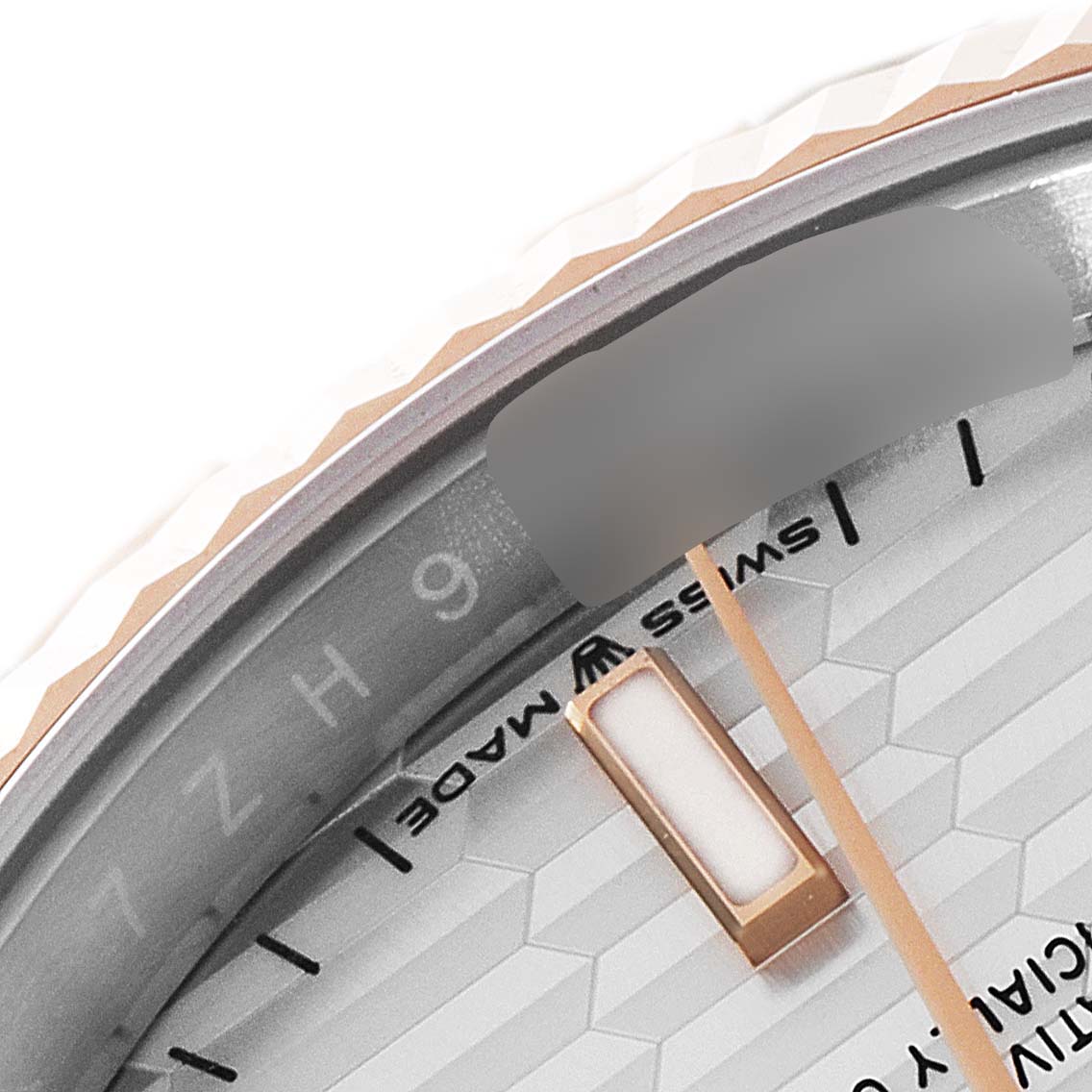 The image shows a close-up of the dial and bezel of a Rolex Datejust 126231 Men's Steel and Gold (two tone) Silver Dial 126231 Men's Steel and Gold (two tone) Silver Dial watch, focusing on the hour markers and "Swiss Made" label.