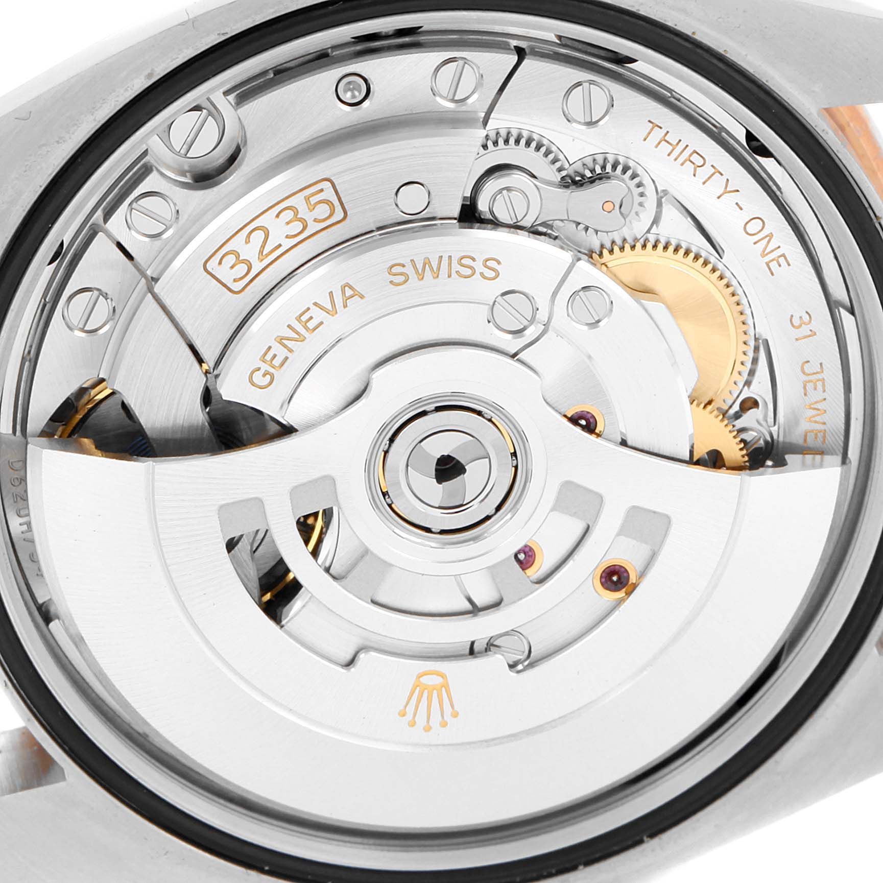 This image shows a close-up of the movement and inner mechanism of the Rolex Datejust 126281 Men's Steel and Gold (two tone) Brown Dial 126281 Men's Steel and Gold (two tone) Brown Dial watch.