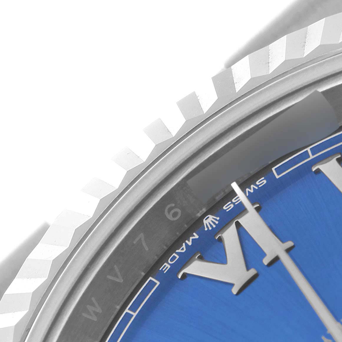 This image shows a close-up of the bezel and part of the blue dial of the Rolex Datejust 41 126334 Men
s Stainless Steel Blue Dial 126334 Men
s Stainless Steel Blue Dial watch.