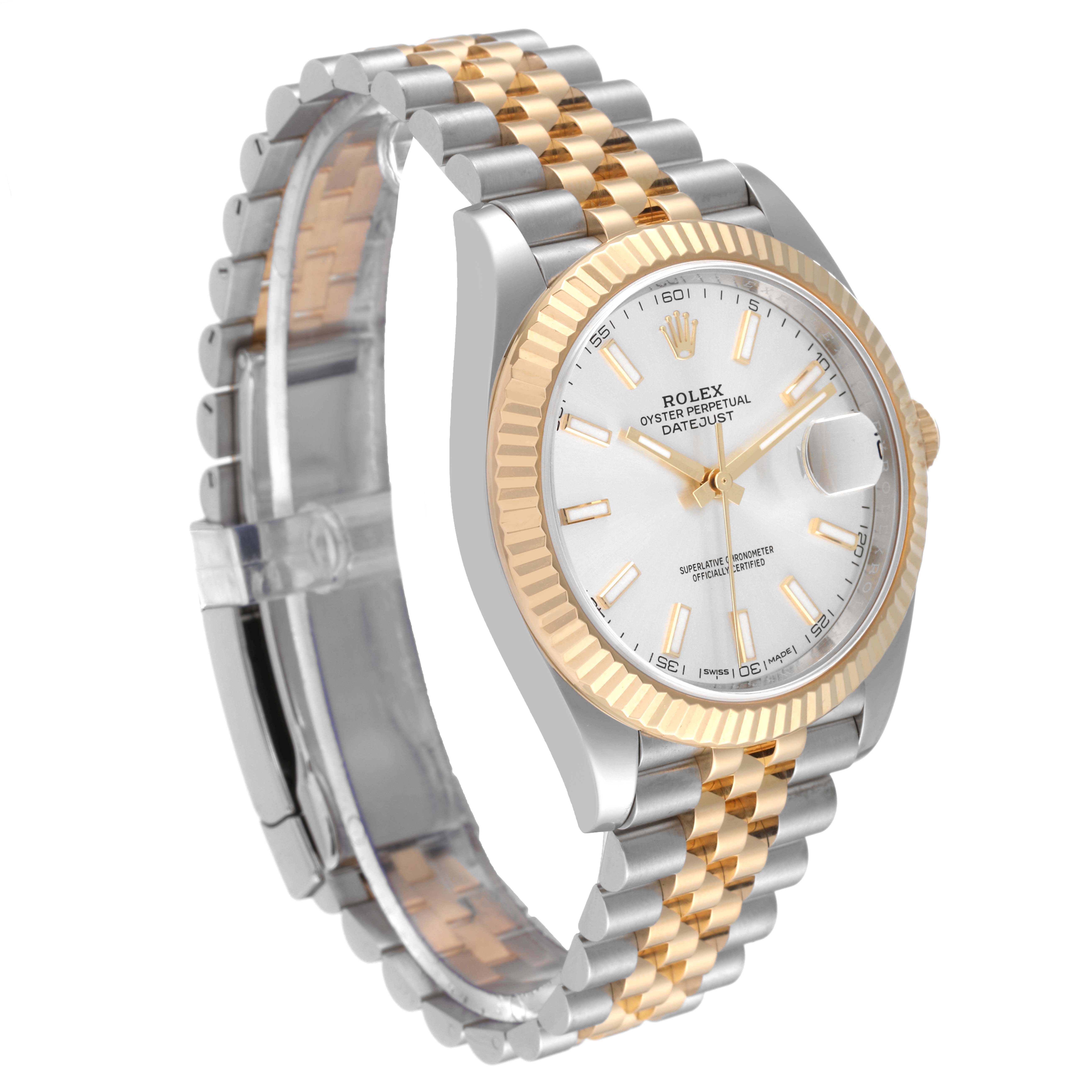 The Rolex Datejust 41 126333 Men's Steel and Gold (two tone) Silver Dial 126333 Men's Steel and Gold (two tone) Silver Dial model is shown at a three-quarter angle, highlighting its gold and steel Jubilee bracelet, fluted bezel, and white dial.