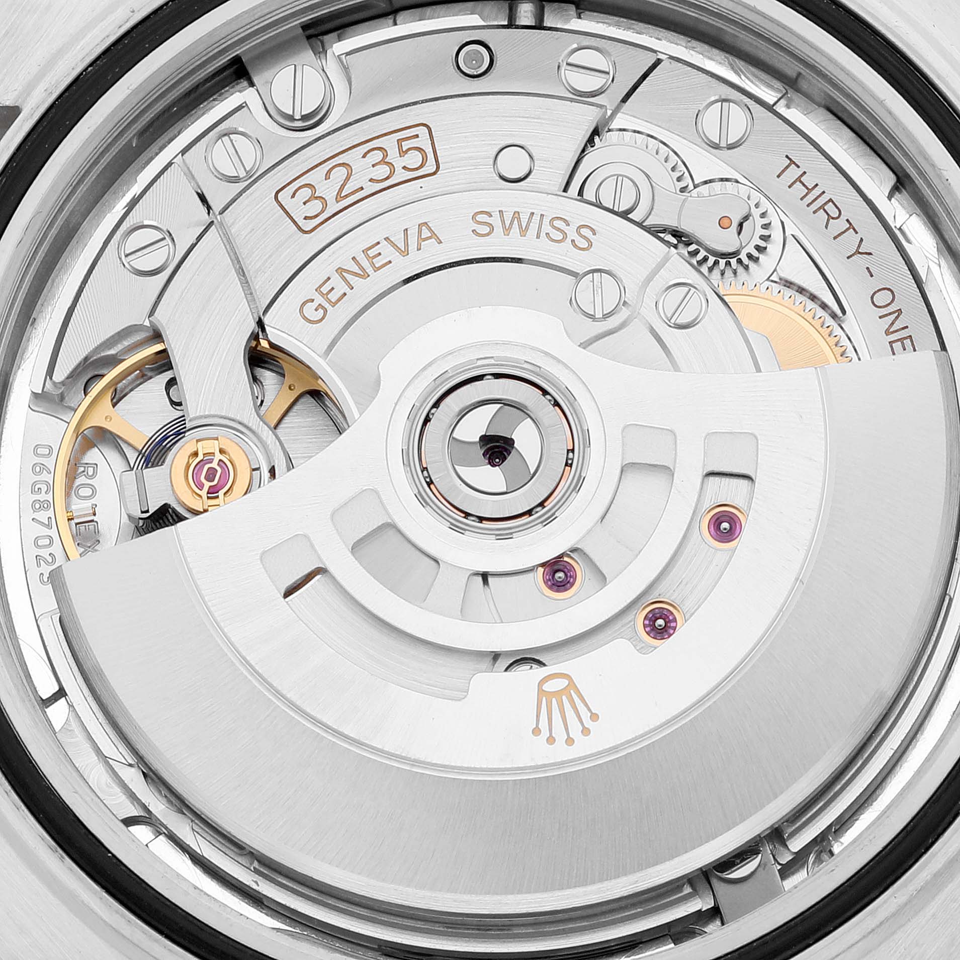 The image shows a close-up view of the Rolex Datejust 41 126333 Men's Steel and Gold (two tone) Silver Dial 126333 Men's Steel and Gold (two tone) Silver Dial model's movement, specifically the Caliber 3235.