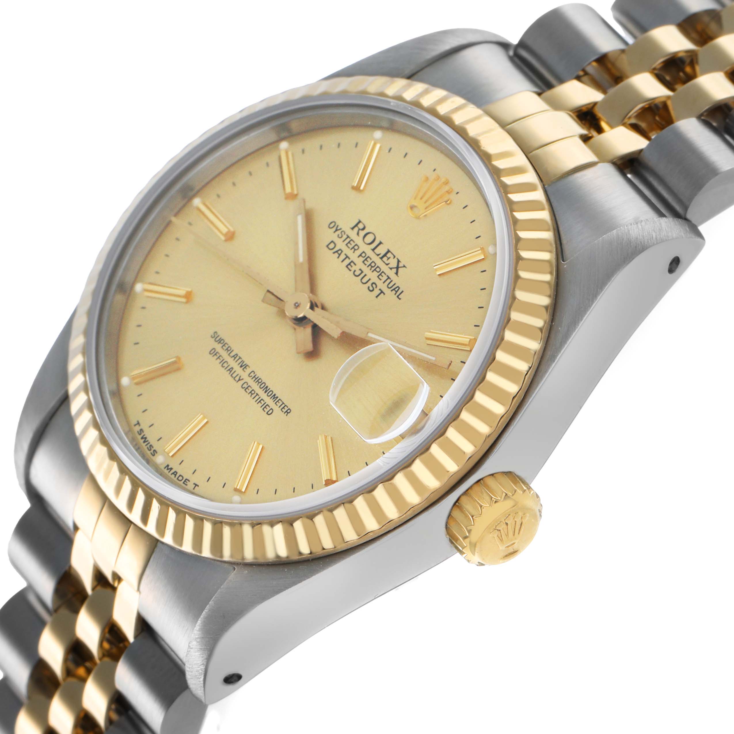The Rolex Datejust 68273 Women's Steel and Gold (two tone) Champagne Dial watch is shown at a slight angle, highlighting the dial, bezel, crown, and part of the bracelet.