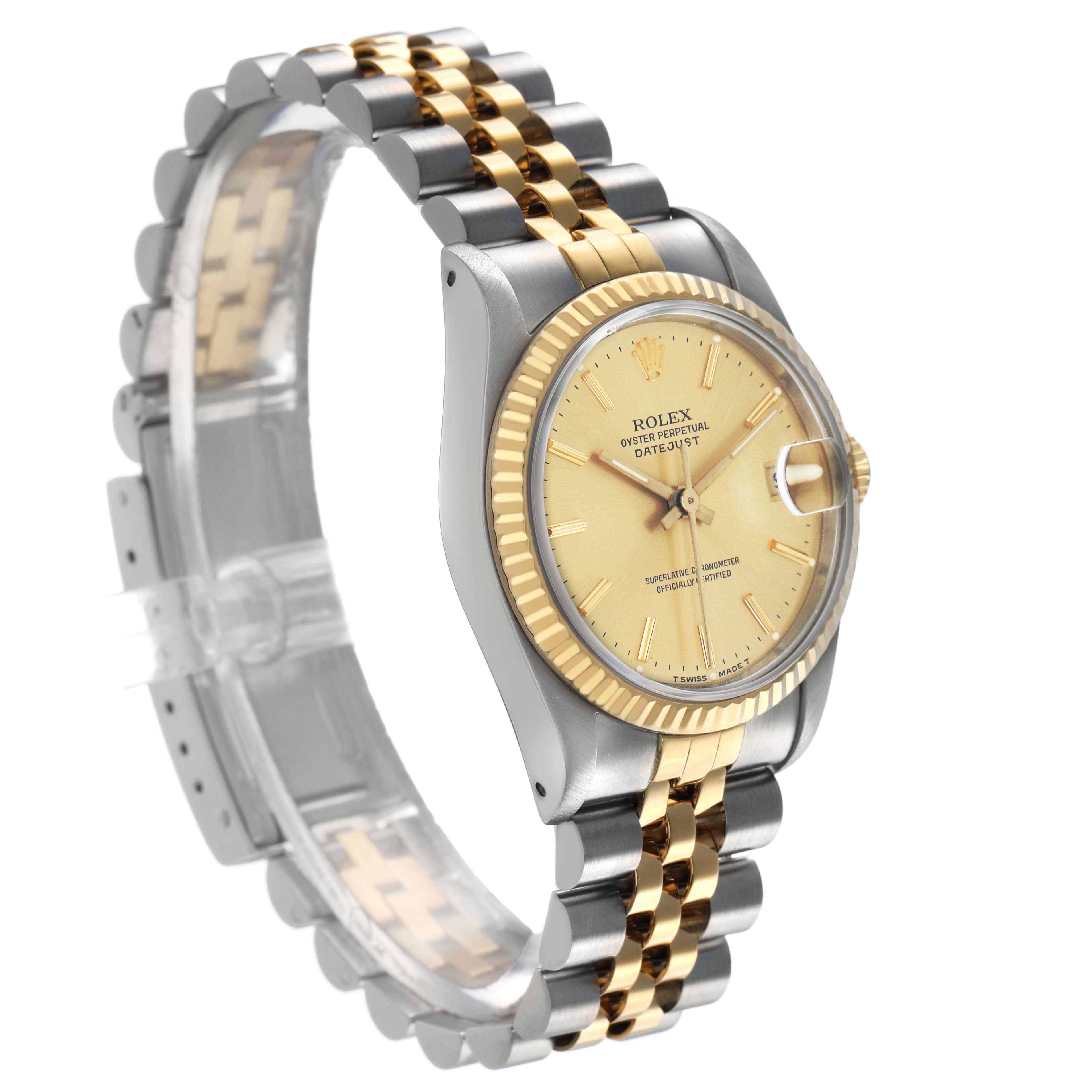 The Rolex Datejust 68273 Women's Steel and Gold (two tone) Champagne Dial watch is shown at a three-quarter angle, displaying the face, bezel, and bracelet.