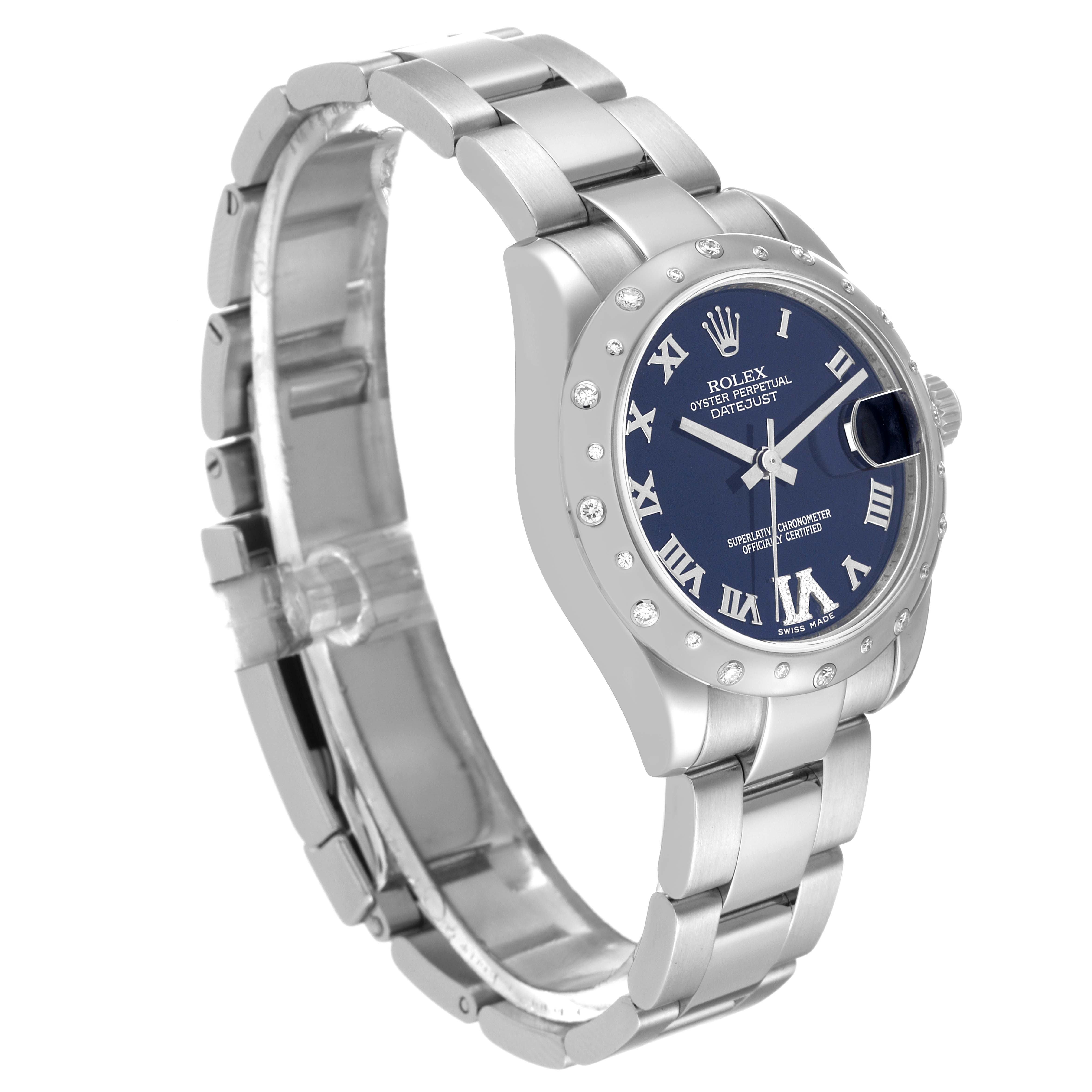 The image shows a side angle view of a mid-size Rolex Datejust watch with a blue dial and a stainless steel bracelet.