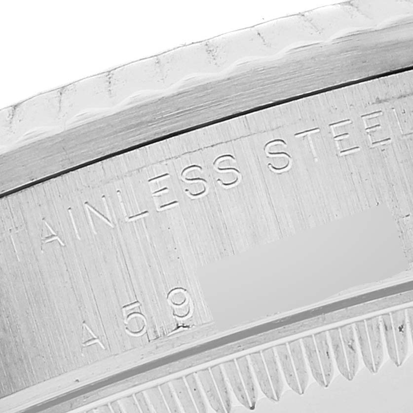 This close-up image shows the stainless steel case back of a Rolex Mid-Size 78274 Women
s Stainless Steel Silver Dial 78274 Women
s Stainless Steel Silver Dial model watch.