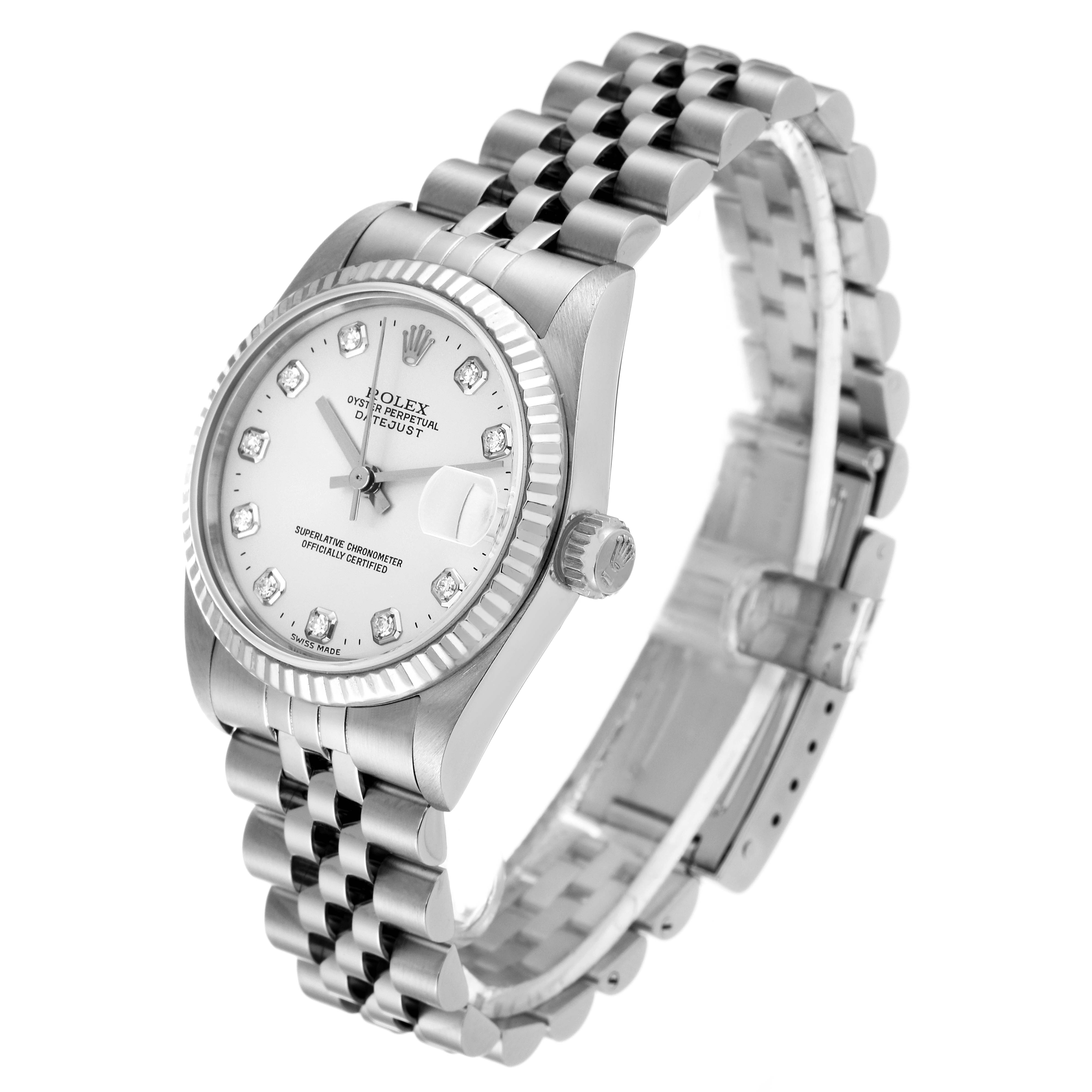 The image shows a Rolex Mid-Size 78274 Women
s Stainless Steel Silver Dial 78274 Women
s Stainless Steel Silver Dial Datejust watch from a three-quarter overhead angle, highlighting the dial, bezel, and bracelet.