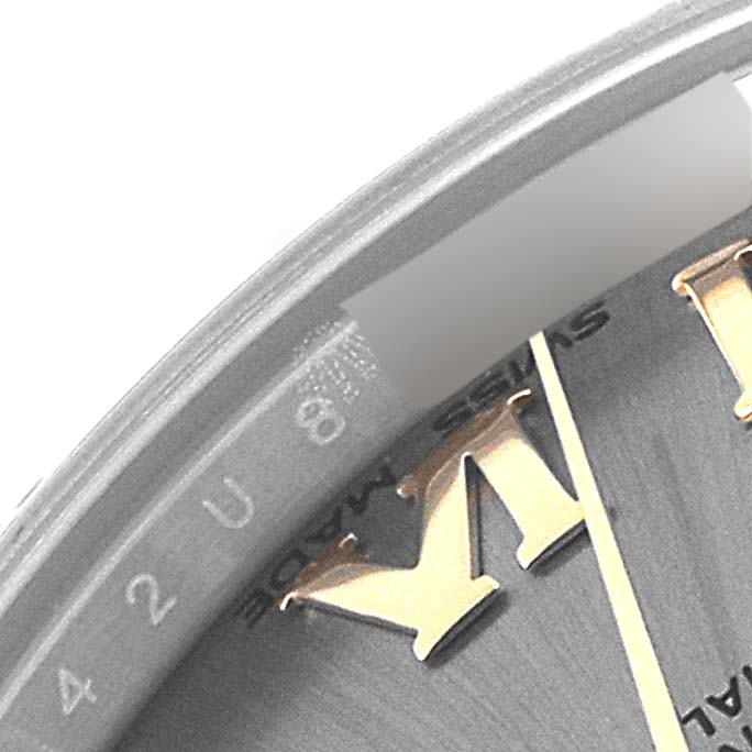 The image shows a close-up of the dial and part of the 
X
 hour marker on a Rolex Mid-Size 178343 Women
s Steel and Gold (two tone) Grey Dial 178343 Women
s Steel and Gold (two tone) Grey Dial watch.