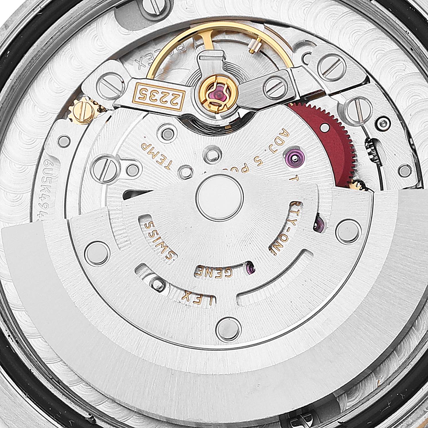 This is a close-up view of the movement and internal components of the Rolex Mid-Size 178343 Women
s Steel and Gold (two tone) Grey Dial 178343 Women
s Steel and Gold (two tone) Grey Dial watch model.