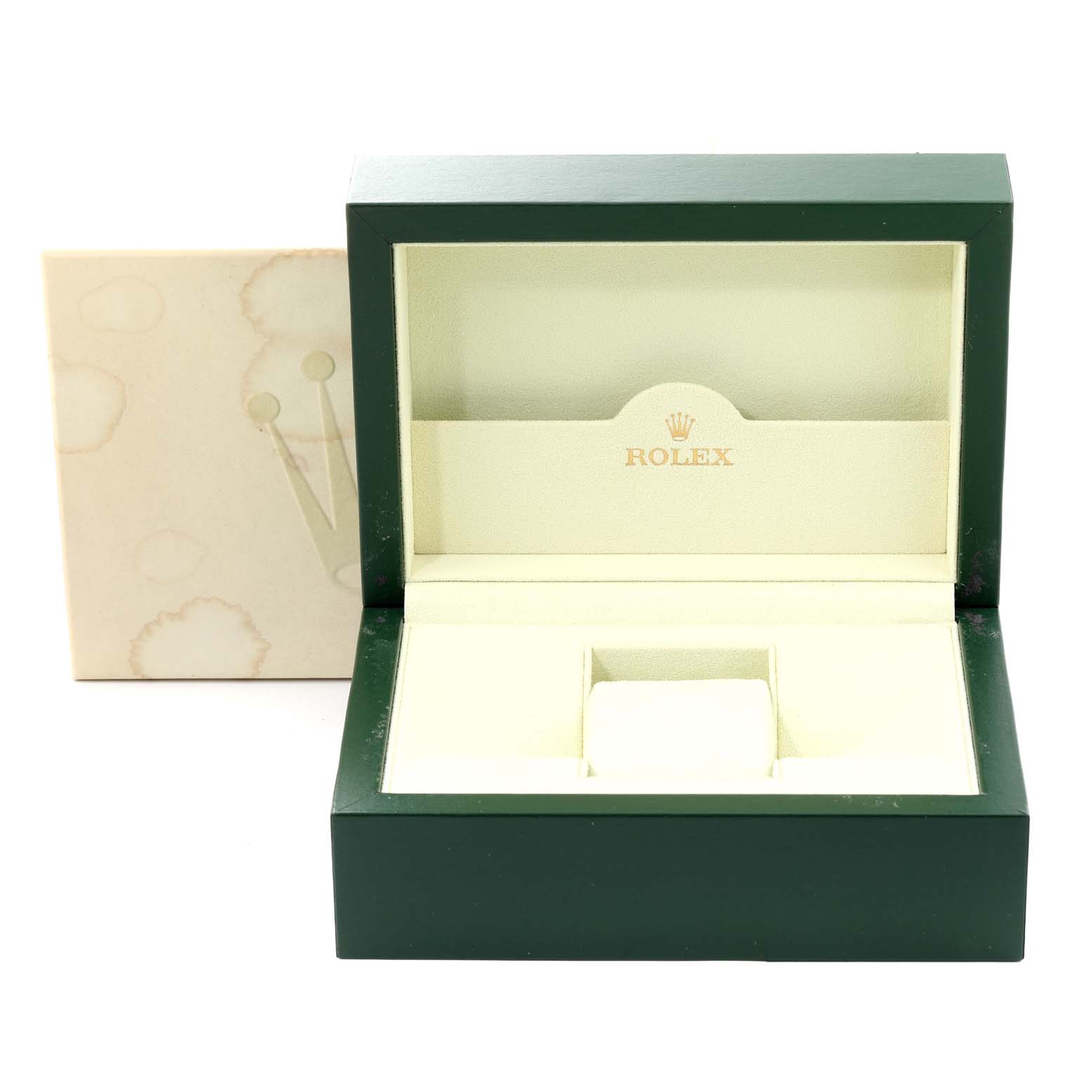 This image shows an open green and cream-colored Rolex watch box for the President model, with an empty slot for the watch.