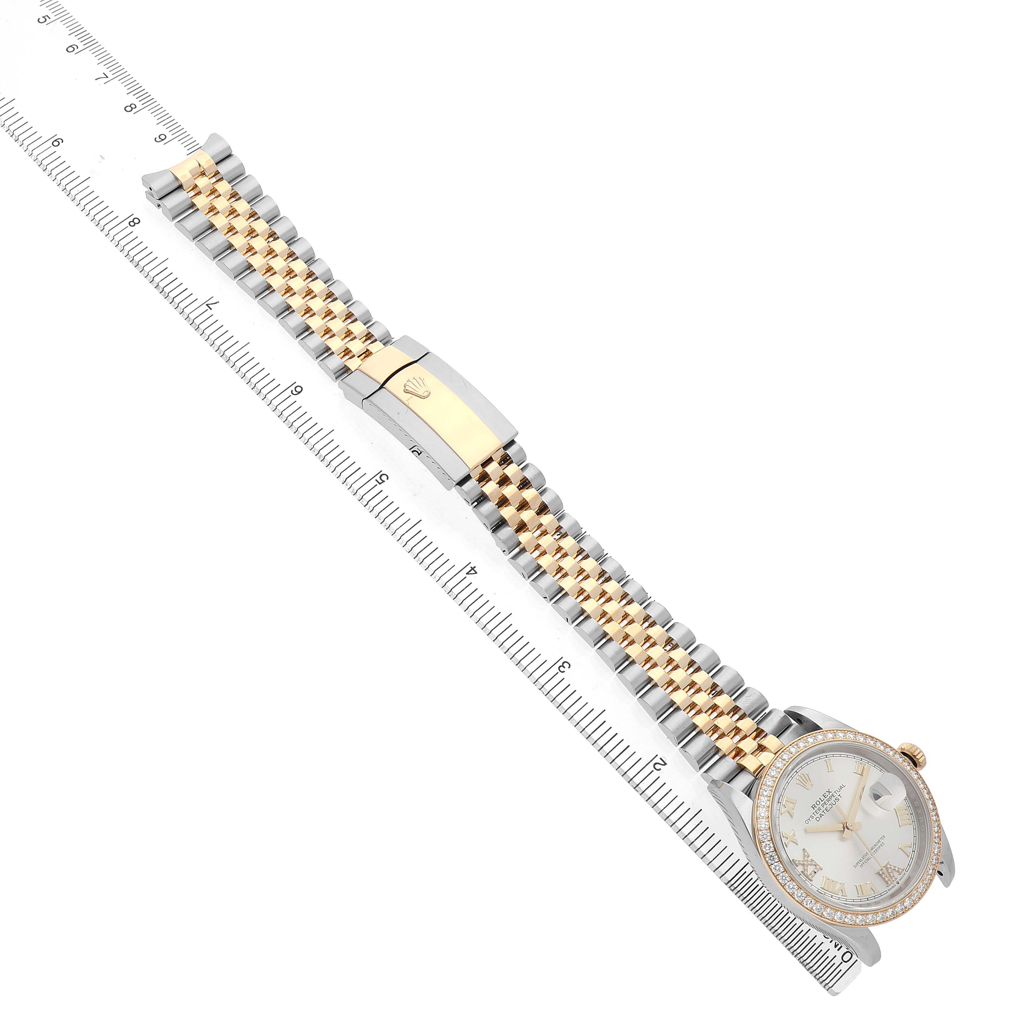 The Rolex Datejust 126283RBR Men's Steel and Gold (two tone) Silver Dial watch is shown from a top view, displaying the face, bezel, bracelet, and clasp.