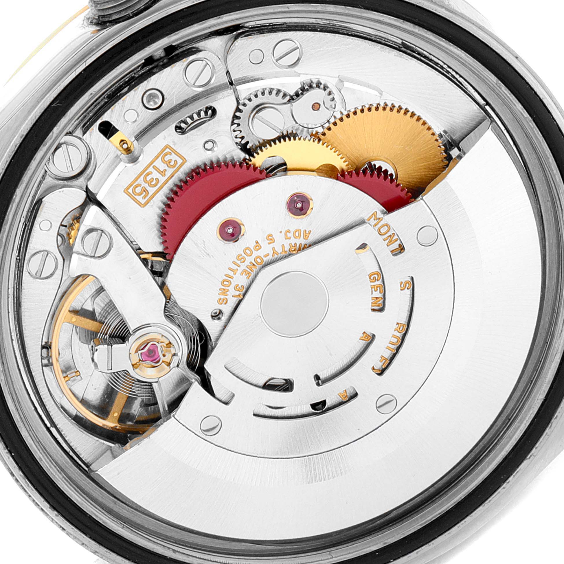 This image shows a close-up view of the movement and internal components of a Rolex Datejust 16233 Men
s Steel and Gold (two tone) Grey Dial 16233 Men
s Steel and Gold (two tone) Grey Dial watch.