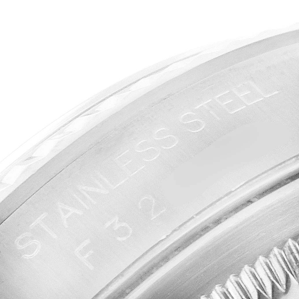 The image shows a close-up of the stainless steel casing and bezel of the Rolex Datejust 16234 Men's Stainless Steel Black Dial 16234 Men's Stainless Steel Black Dial watch.