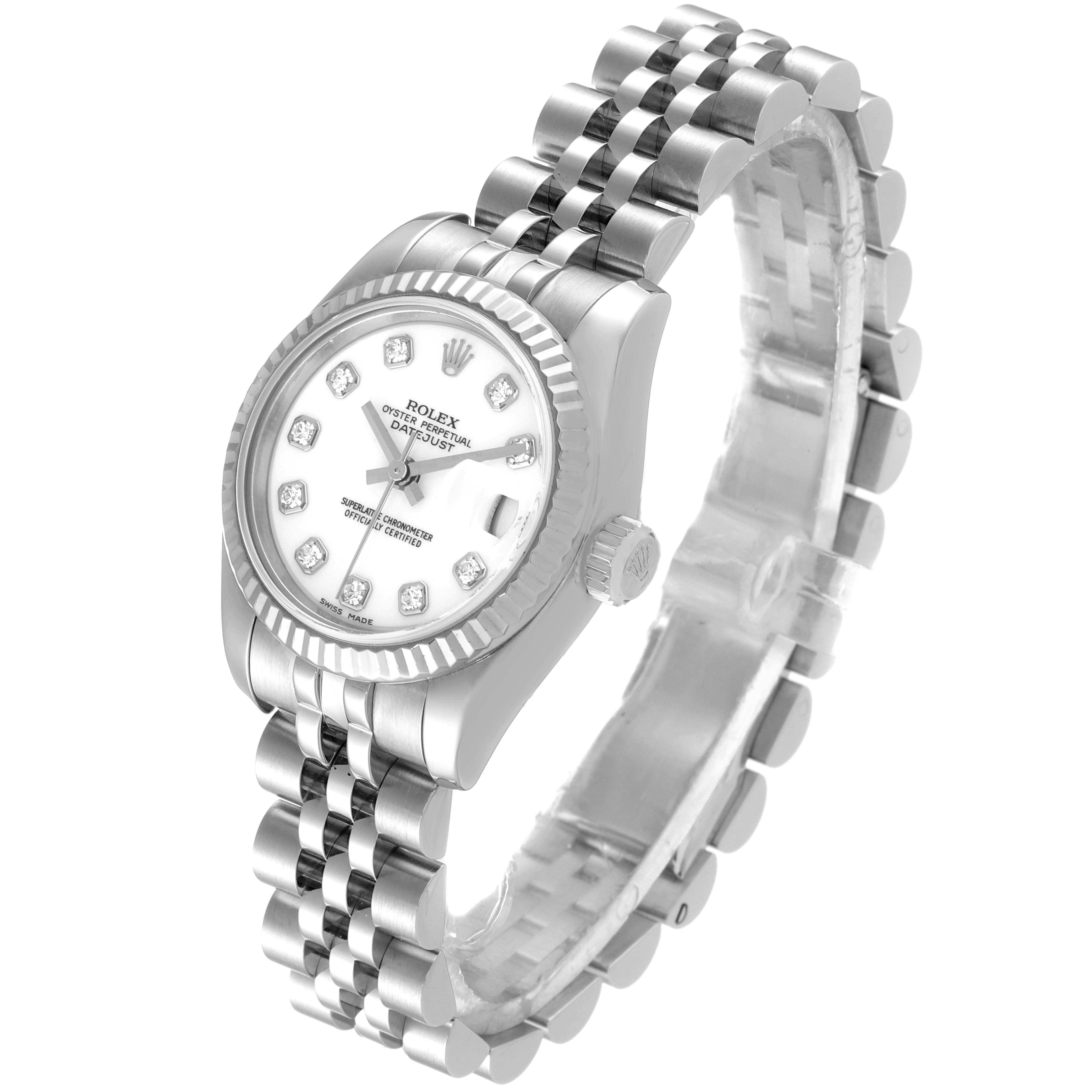 The Rolex Datejust 179174 Women's Stainless Steel White Dial 179174 Women's Stainless Steel White Dial watch is shown at a slight diagonal angle, highlighting its face, bezel, crown, and part of the bracelet.
