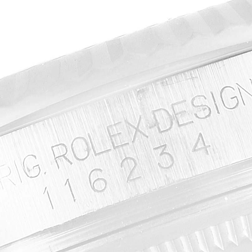 This image shows a close-up of the case and model number of a Rolex Datejust 116234 Men's Stainless Steel Mother of Pearl Dial 116234 Men's Stainless Steel Mother of Pearl Dial watch, focusing on the engravings.
