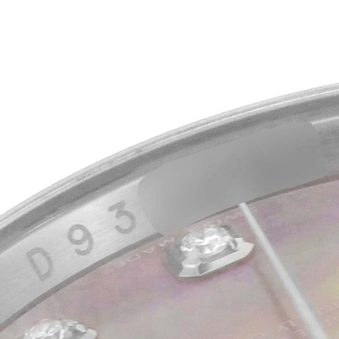 This image shows a close-up of the dial and part of the serial number of a Rolex Datejust 116234 Men's Stainless Steel Mother of Pearl Dial 116234 Men's Stainless Steel Mother of Pearl Dial watch.