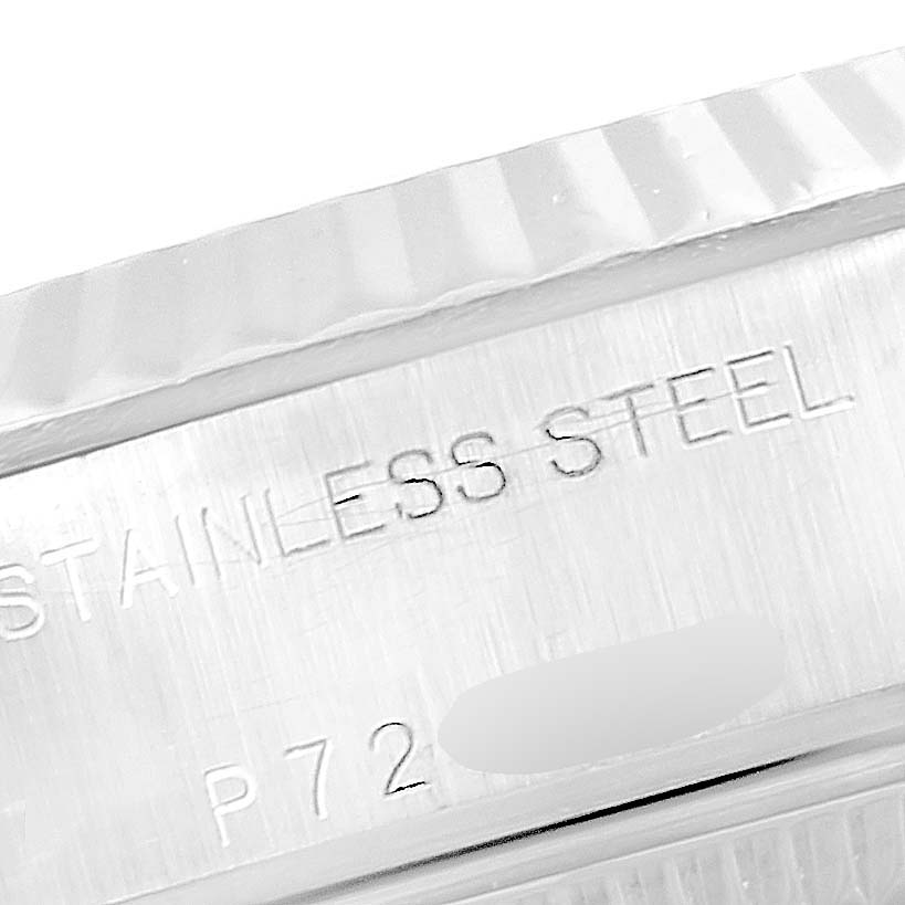 This image shows a close-up of the edge and inscription on a Rolex Datejust 79174 Women's Stainless Steel Pink Dial 79174 Women's Stainless Steel Pink Dial watch in stainless steel.