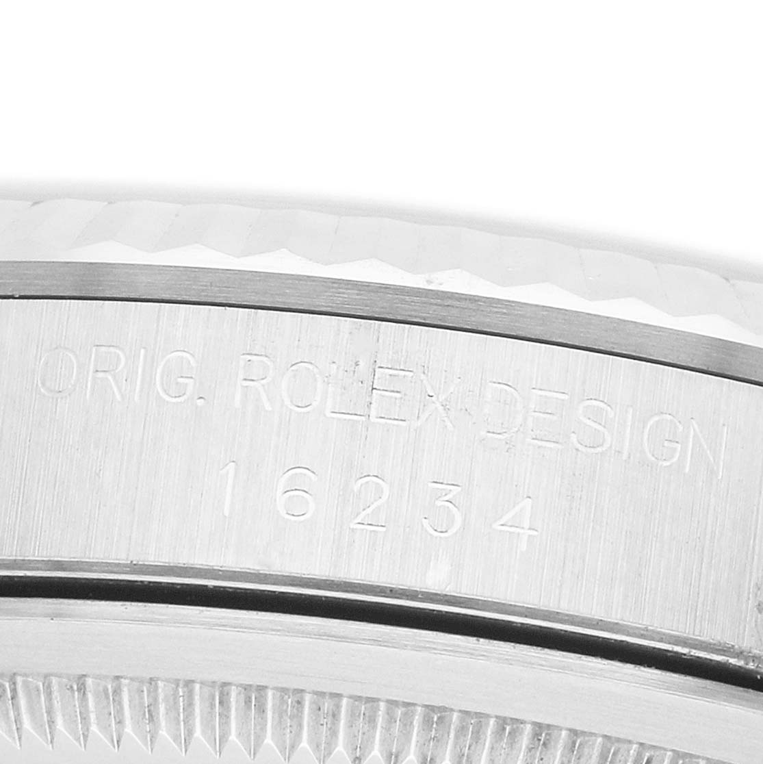 The image shows a close-up of the side engraving on a Rolex Datejust 16234 Men's Stainless Steel Silver Dial, displaying "ORIG. ROLEX DESIGN" and the model number "16234".