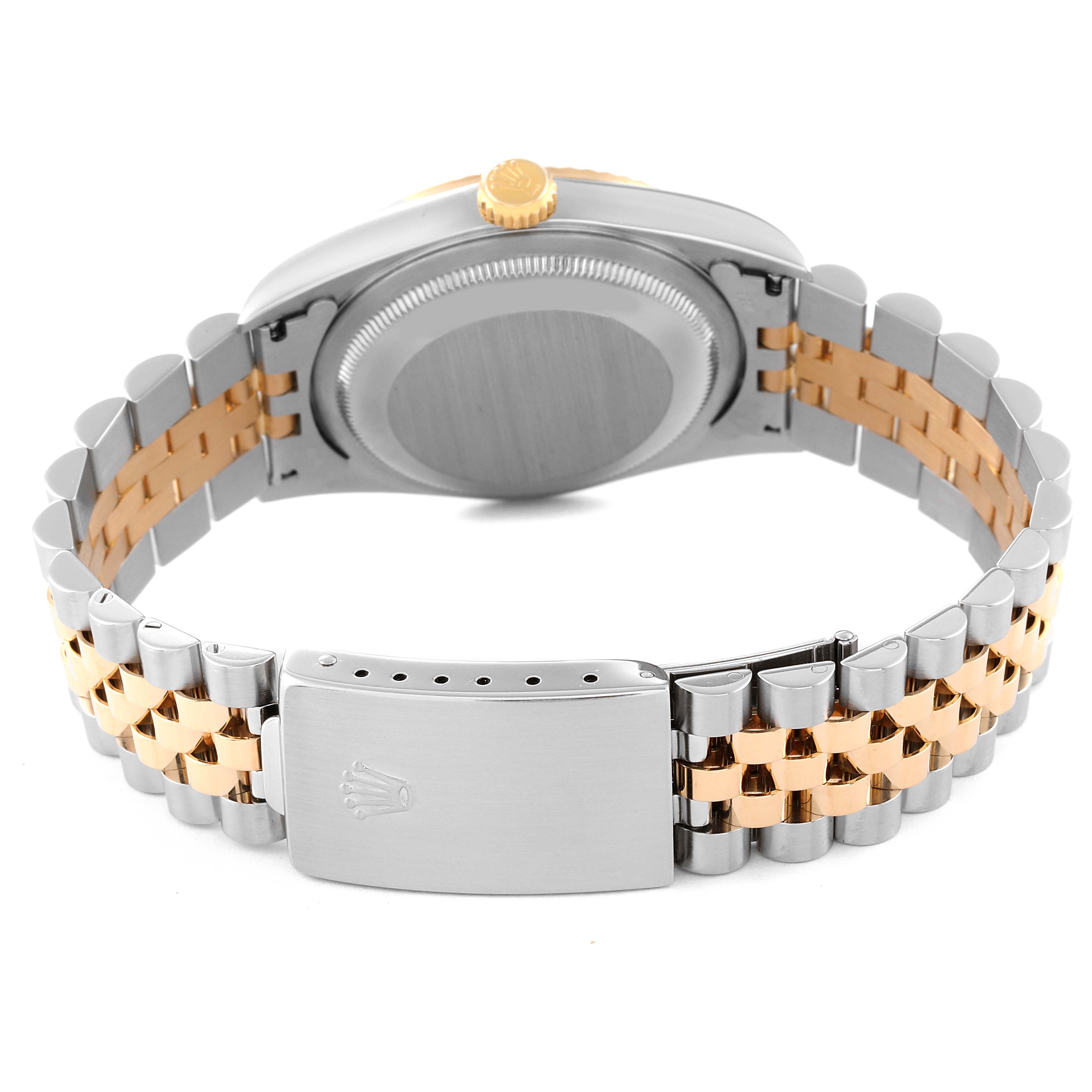 The image shows the back case and bracelet of a Rolex Datejust 16233 Men's Steel and Gold (two tone) Champagne Dial 16233 Men's Steel and Gold (two tone) Champagne Dial watch, highlighting its two-tone Jubilee bracelet and clasp.