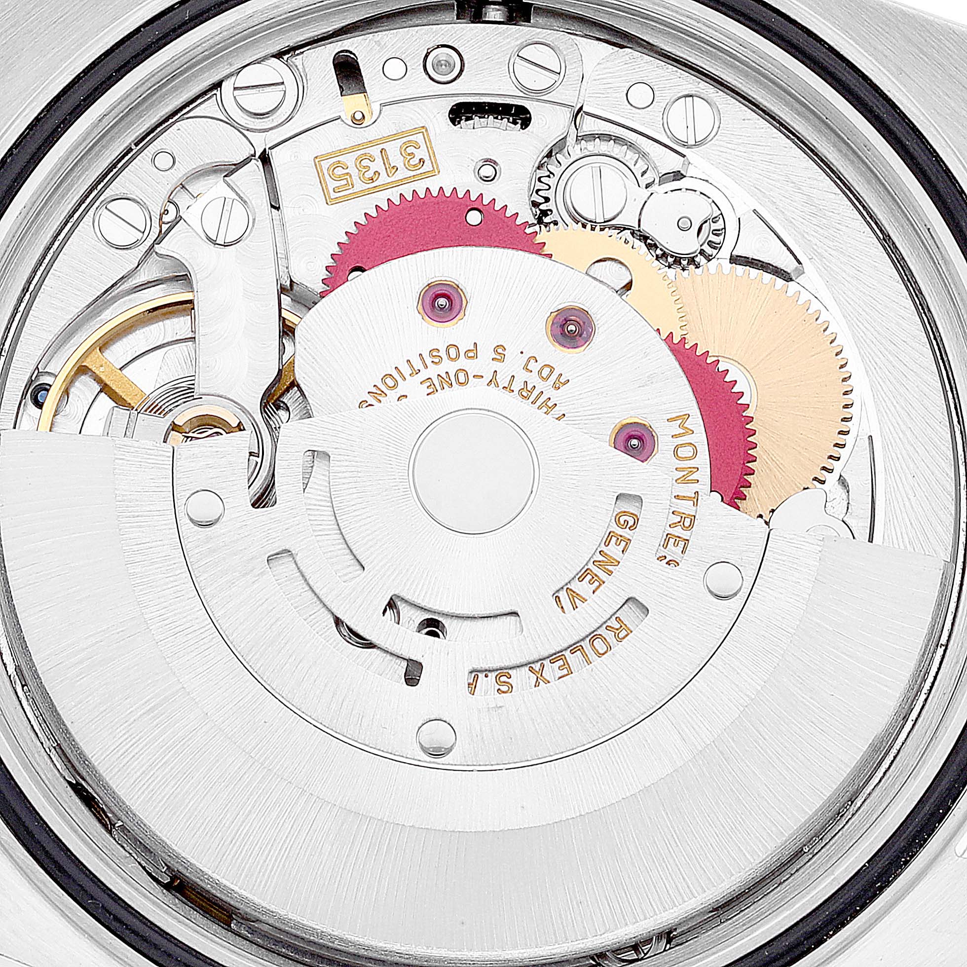 This image shows the inner mechanical movement of a Rolex Datejust 16233 Men's Steel and Gold (two tone) Champagne Dial 16233 Men's Steel and Gold (two tone) Champagne Dial watch, highlighting gears and the winding mechanism.