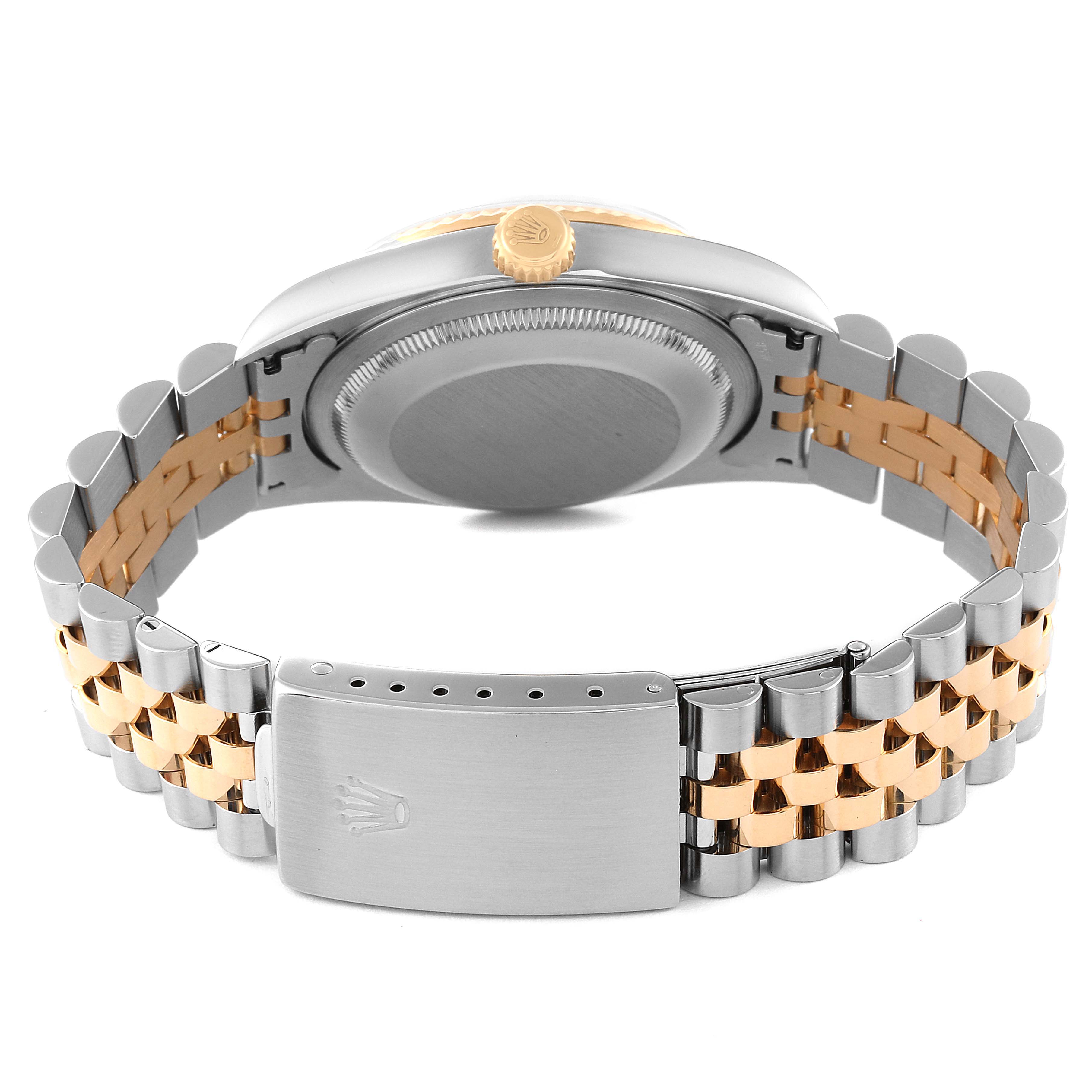 The image shows the back view of a Rolex Datejust 16233 Men's Steel and Gold (two tone) Champagne Dial 16233 Men's Steel and Gold (two tone) Champagne Dial watch, highlighting the case back and Jubilee bracelet.