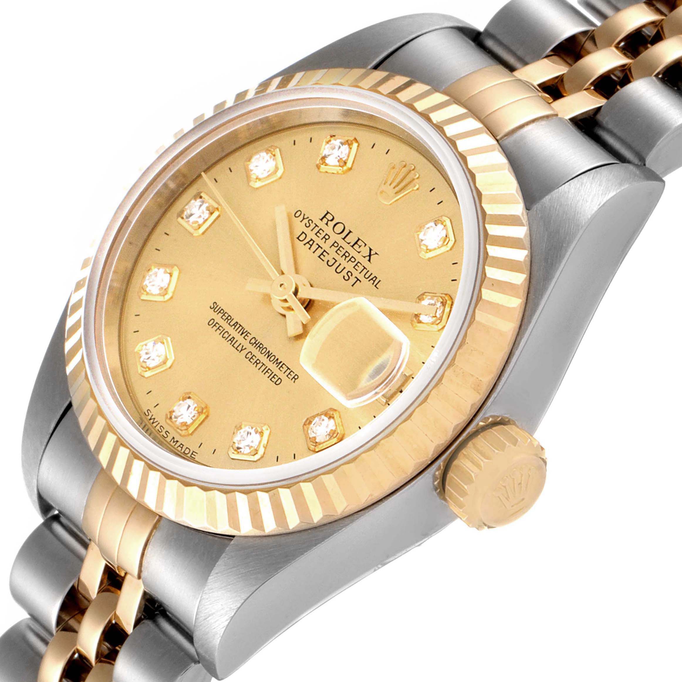 This image shows a close-up, angled view of a Rolex Datejust 79173 Women
s Steel and Gold (two tone) Champagne Dial 79173 Women
s Steel and Gold (two tone) Champagne Dial watch, highlighting the face, bezel, and crown.
