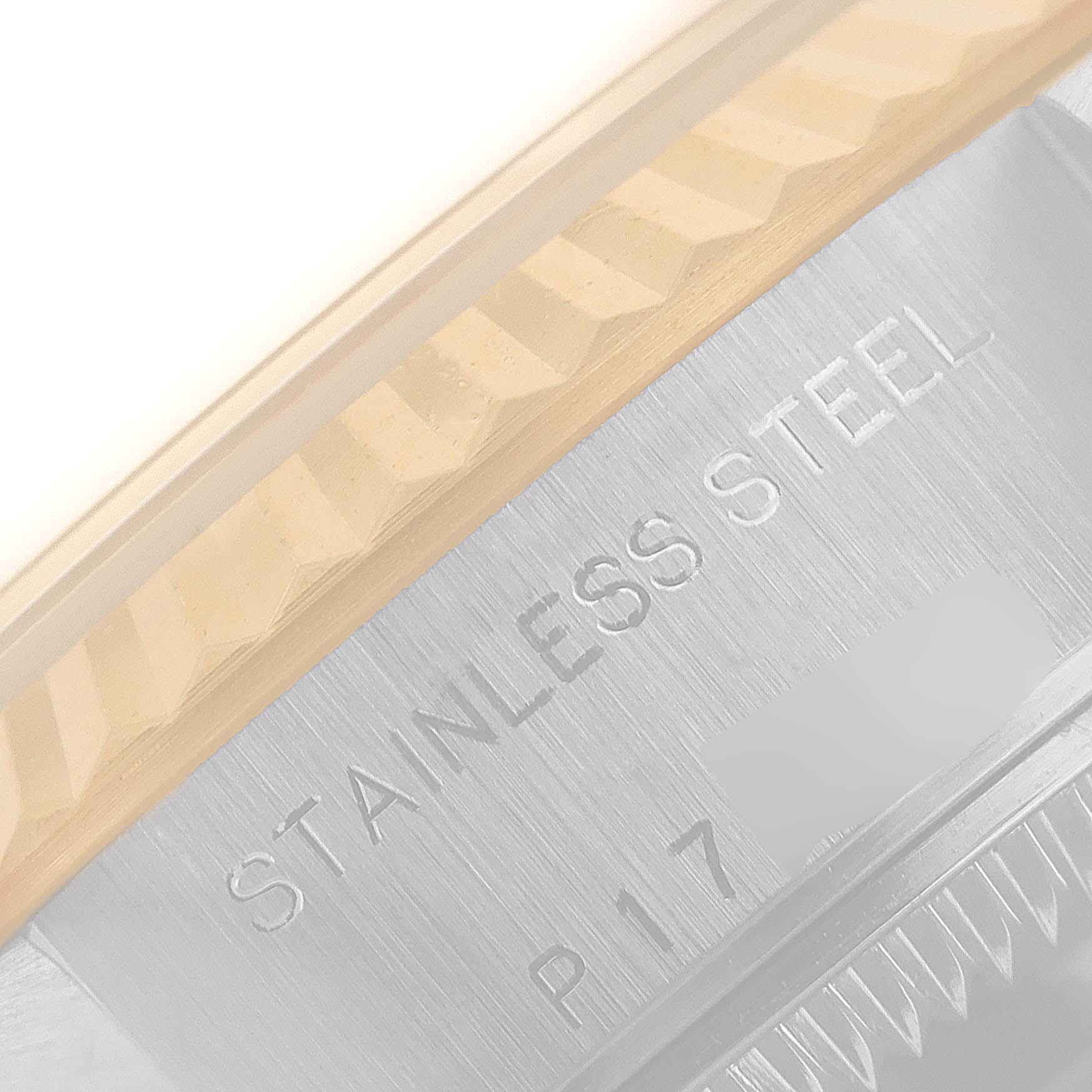 This image shows a close-up of the stainless steel case and fluted bezel of a Rolex Datejust 79173 Women
s Steel and Gold (two tone) Champagne Dial 79173 Women
s Steel and Gold (two tone) Champagne Dial watch.