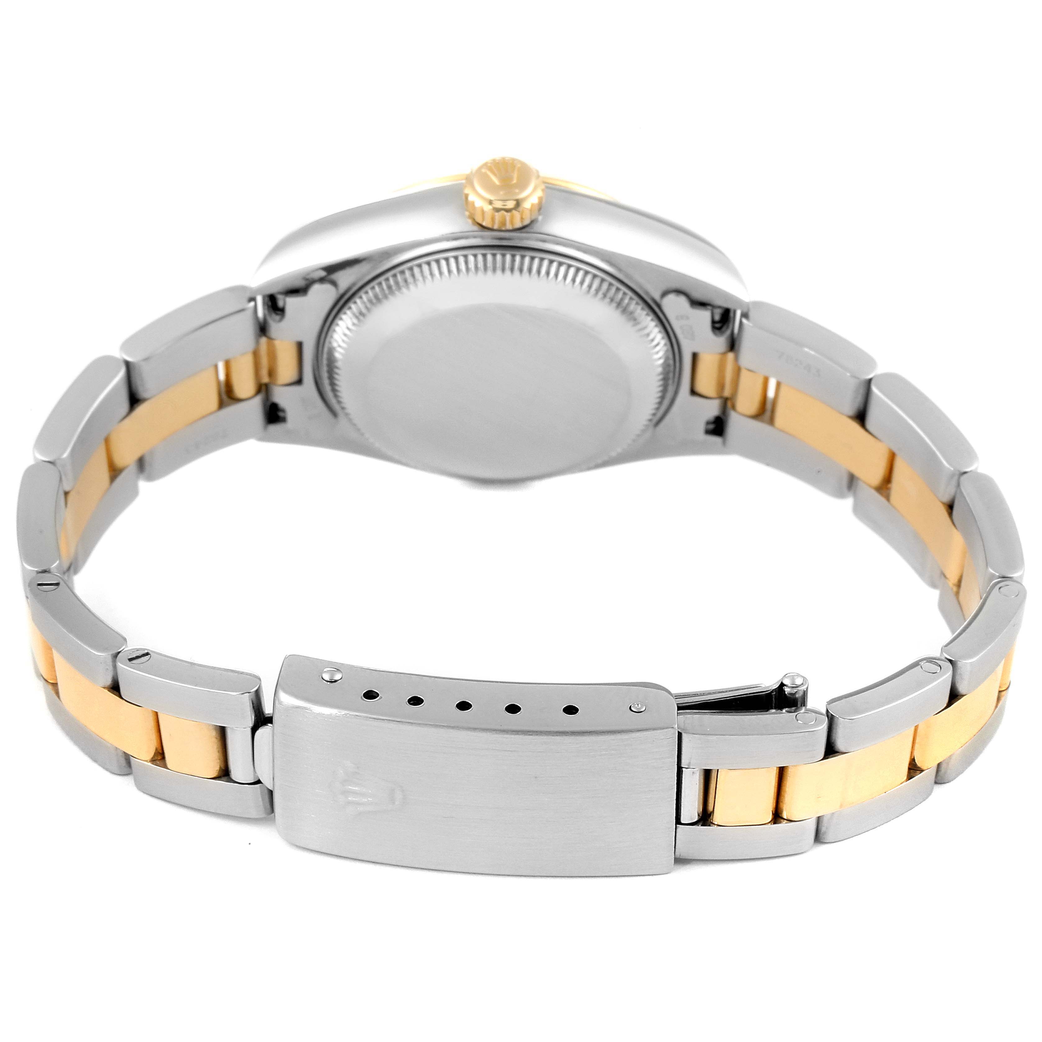 This image shows the back case and clasp of a Datejust model by Rolex, highlighting the two-tone metal bracelet.