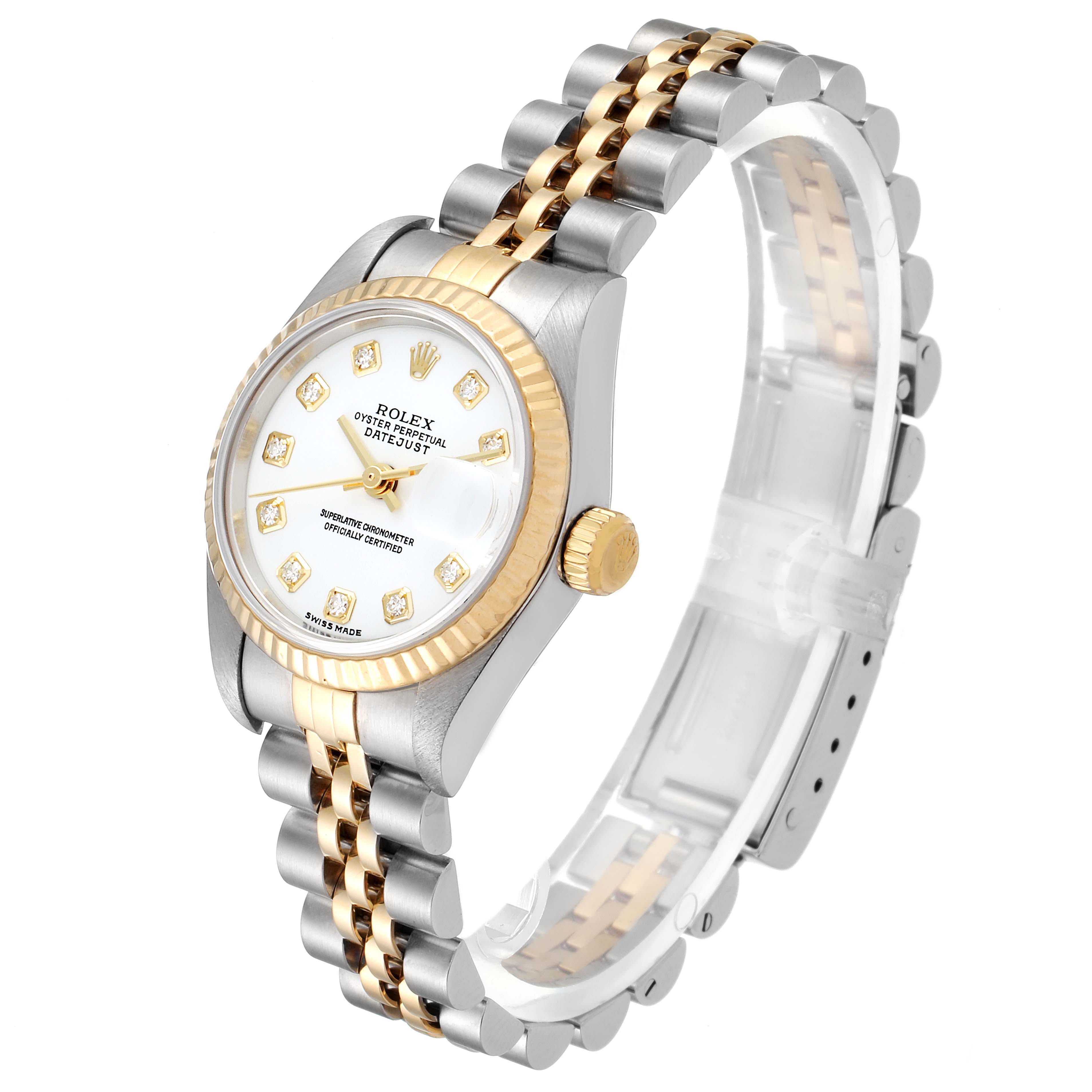This Rolex Datejust 79173 Women's Steel and Gold (two tone) White Dial 79173 Women's Steel and Gold (two tone) White Dial watch is shown at a three-quarter angle featuring a two-tone bracelet, fluted bezel, and diamond hour markers.