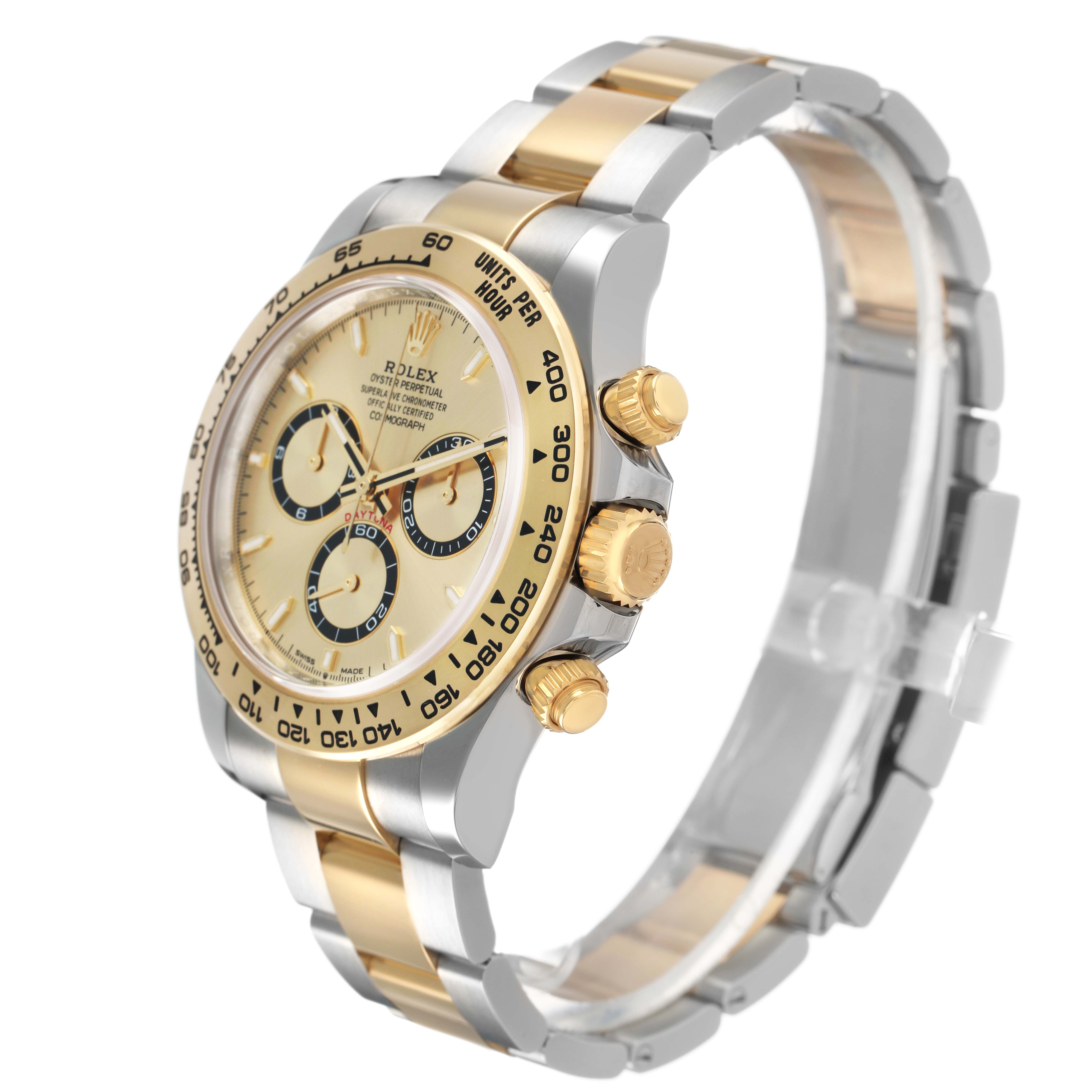 The Rolex Daytona 126503 Men's Steel and Gold (two tone) Champagne Dial watch is shown at an angled side view, displaying the dial, chronograph pushers, bezel, and part of the bracelet.