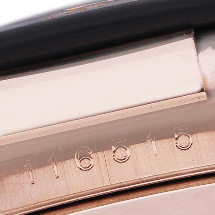 The image shows a close-up of the side and edge of the bezel on a Rolex Daytona 116515LN Men's Rose Gold Brown Dial, revealing part of the model number.